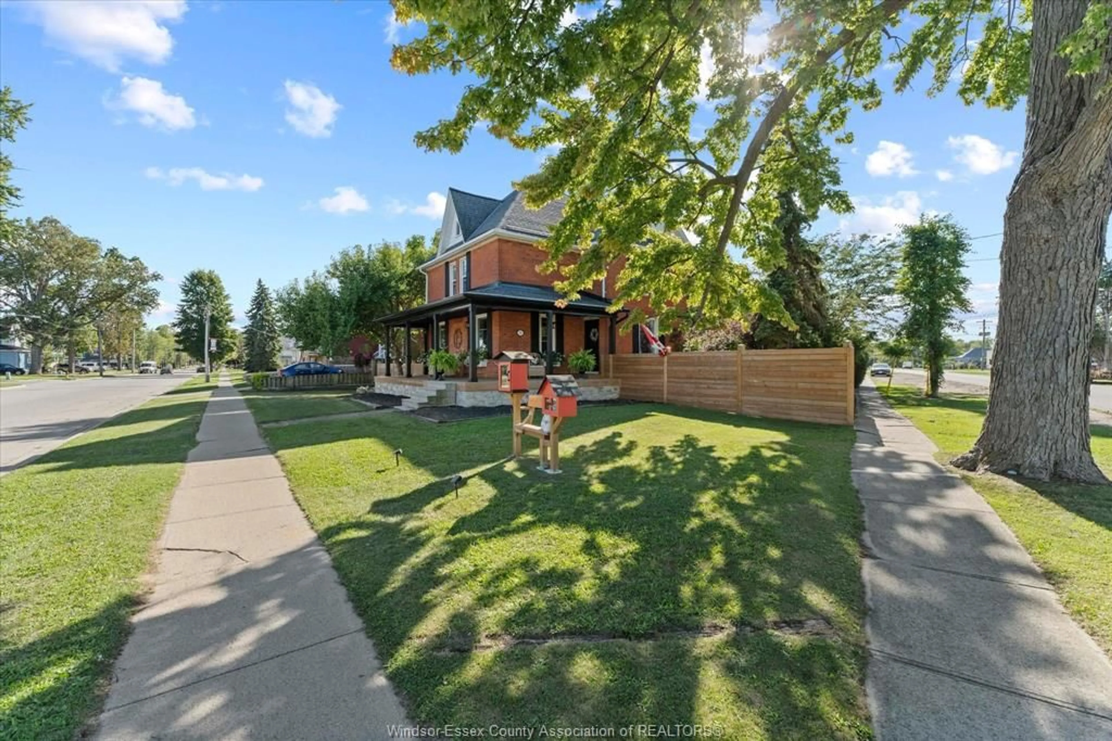 A pic from outside/outdoor area/front of a property/back of a property/a pic from drone, street for 48 ERIE St, Wheatley Ontario N0P 2P0