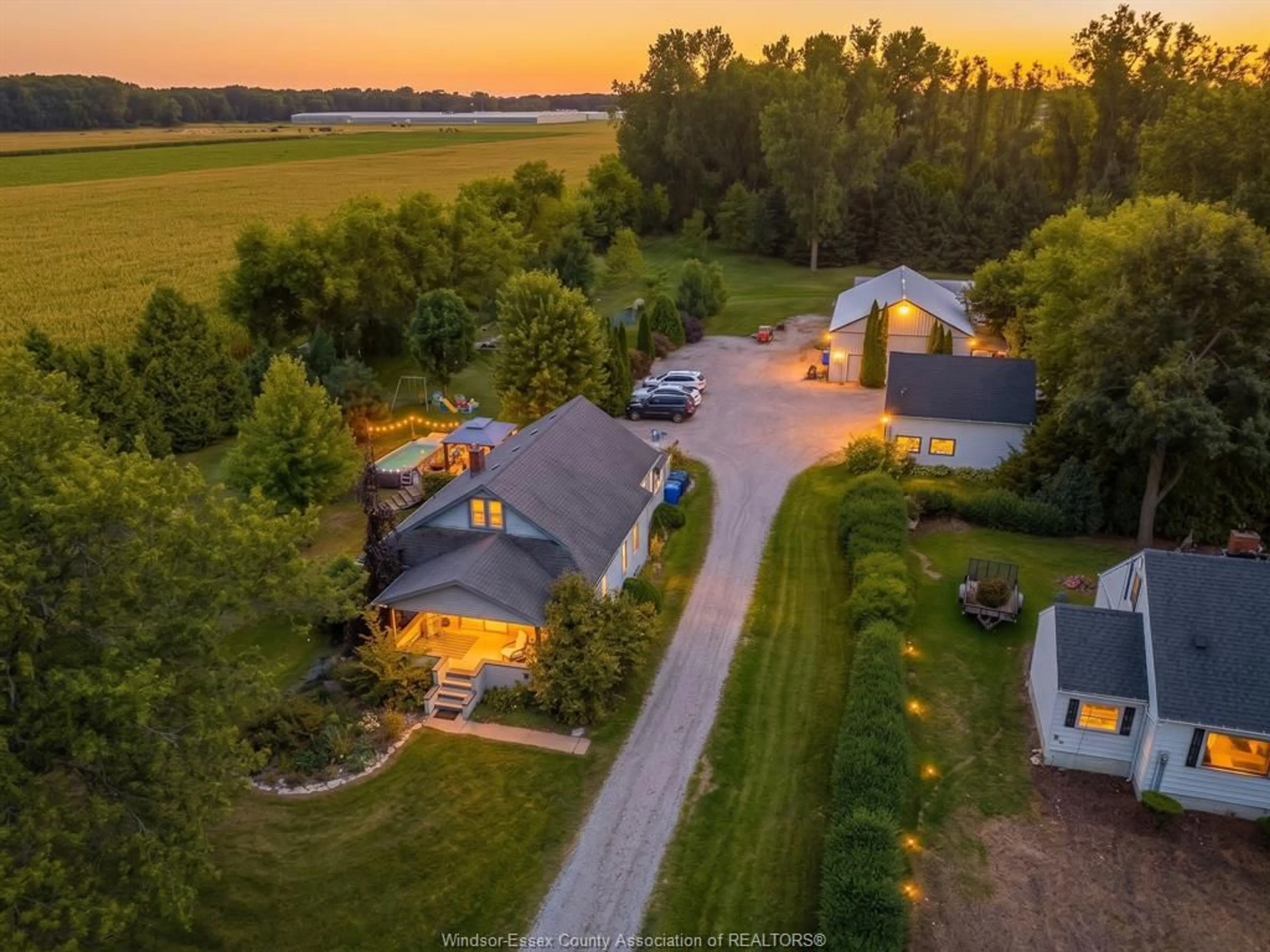 A pic from outside/outdoor area/front of a property/back of a property/a pic from drone, street for 136 MERSEA ROAD 5, Leamington Ontario N8H 3V5