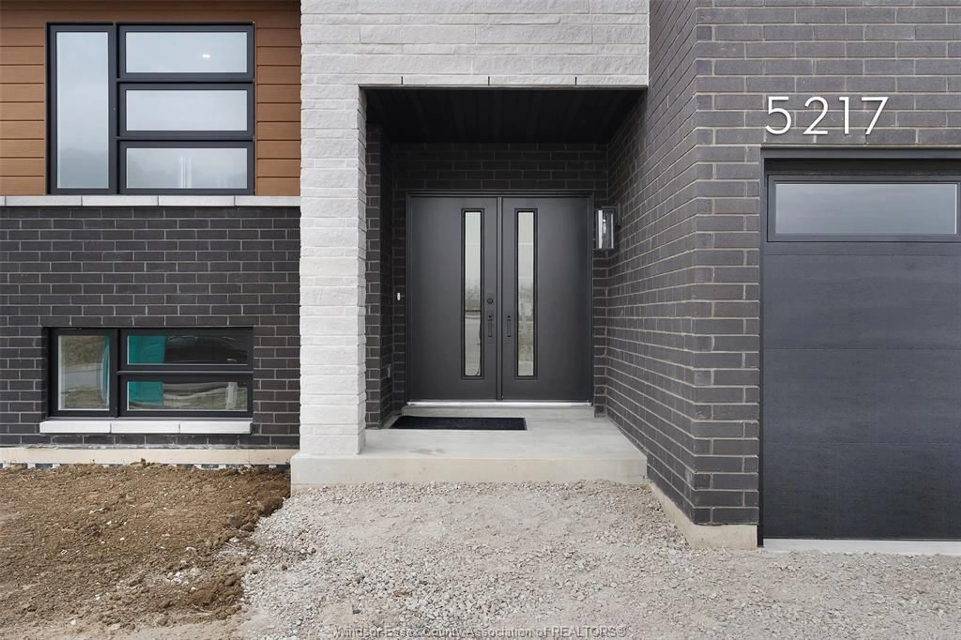 Home with brick exterior material, street for 2410 PARTINGTON, Windsor Ontario N9E 0A8