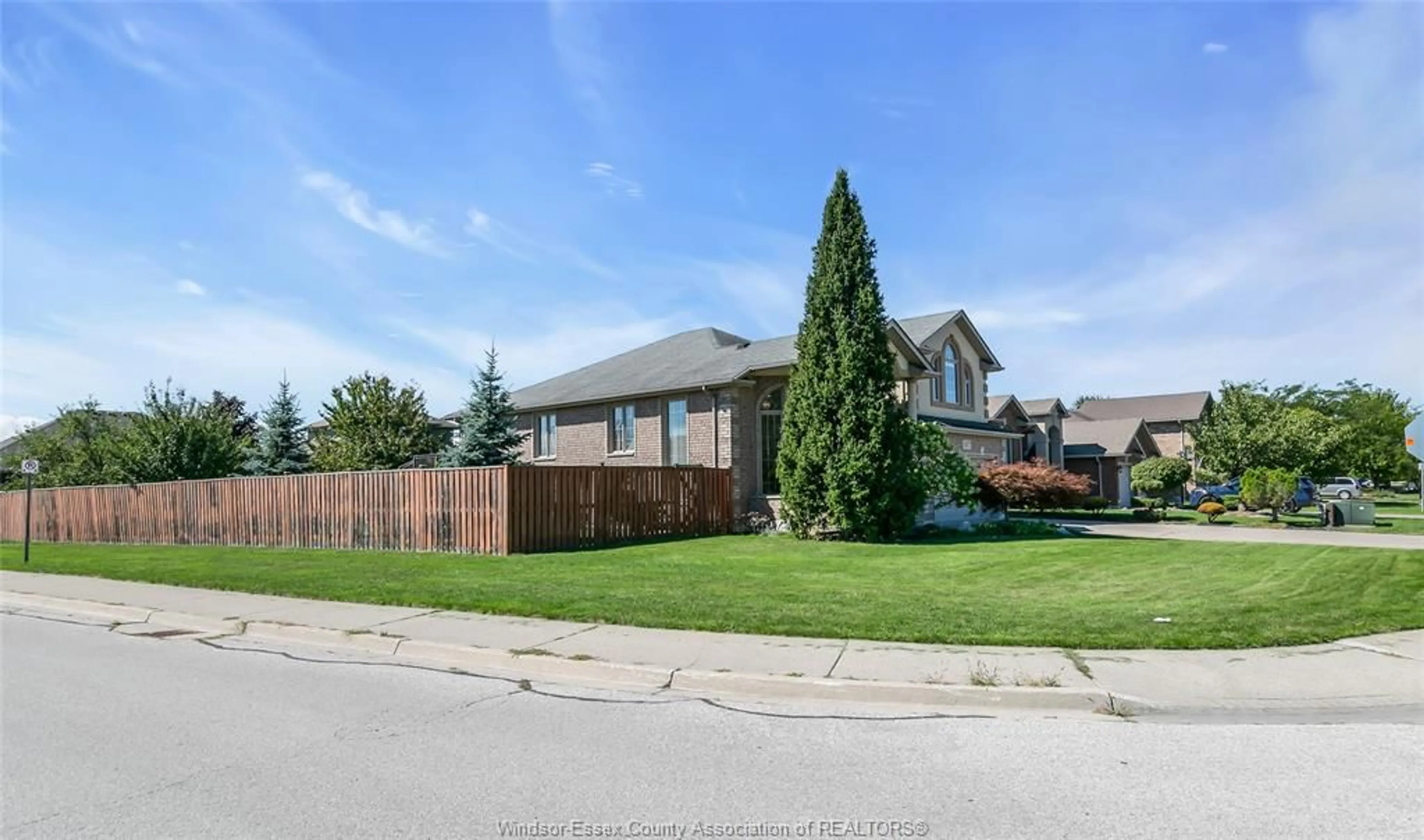 Home with brick exterior material, street for 1377 GIRARD Dr, Lakeshore Ontario N0R 1A0