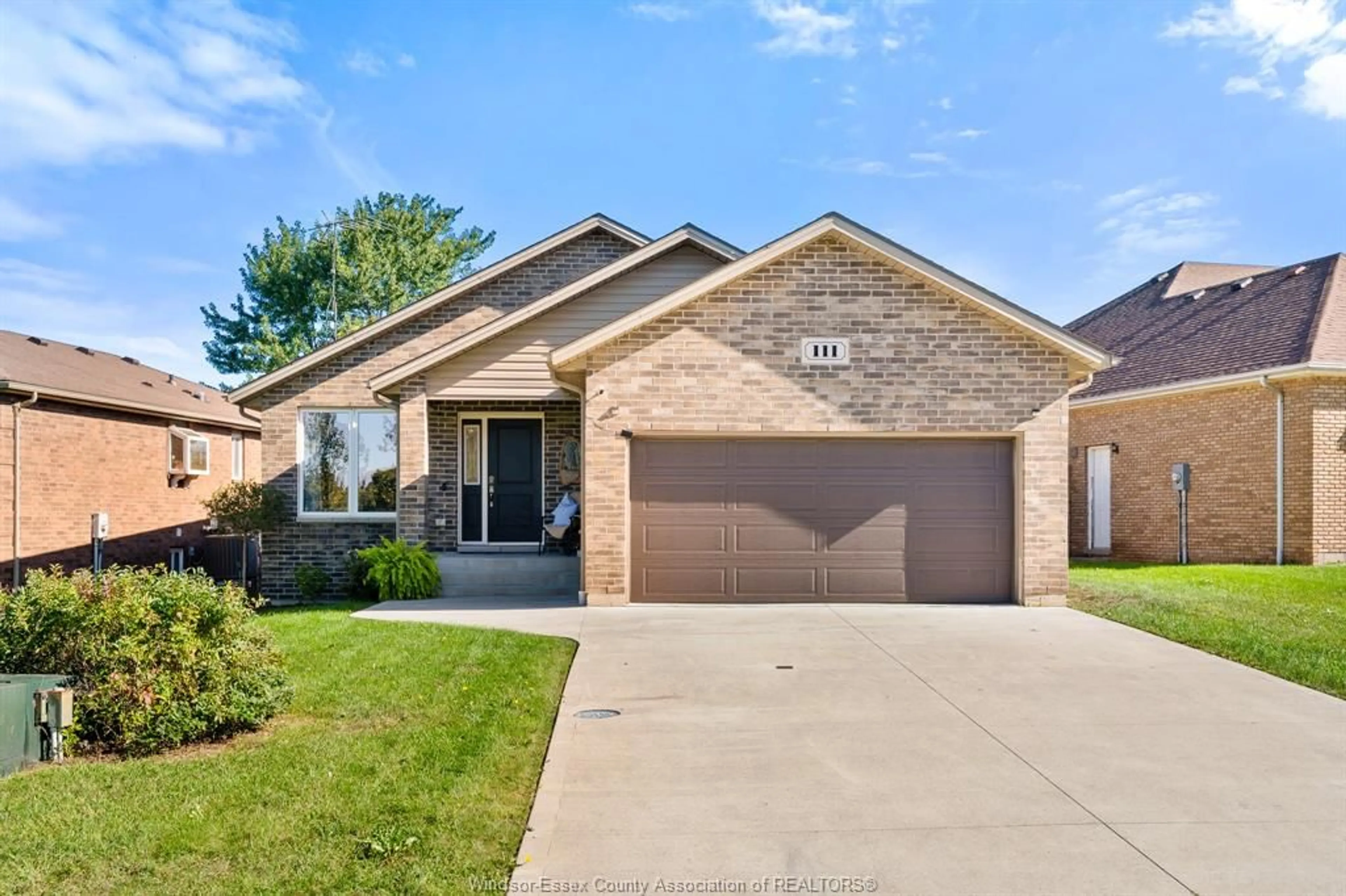 Home with brick exterior material, street for 111 Ellison Ave, Leamington Ontario N8H 5C9