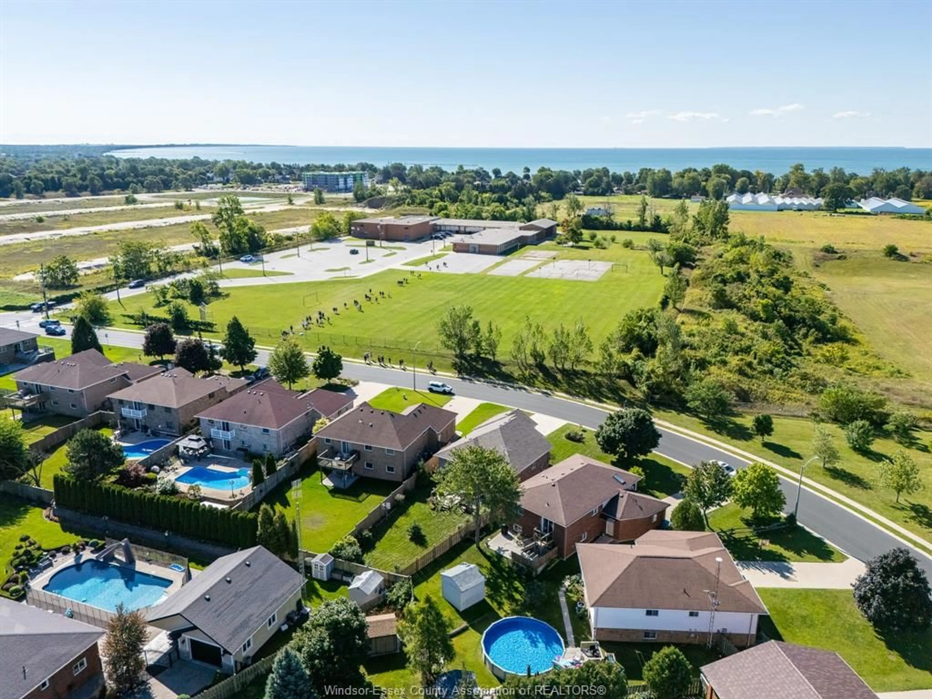A pic from outside/outdoor area/front of a property/back of a property/a pic from drone, water/lake/river/ocean view for 111 Ellison Ave, Leamington Ontario N8H 5C9