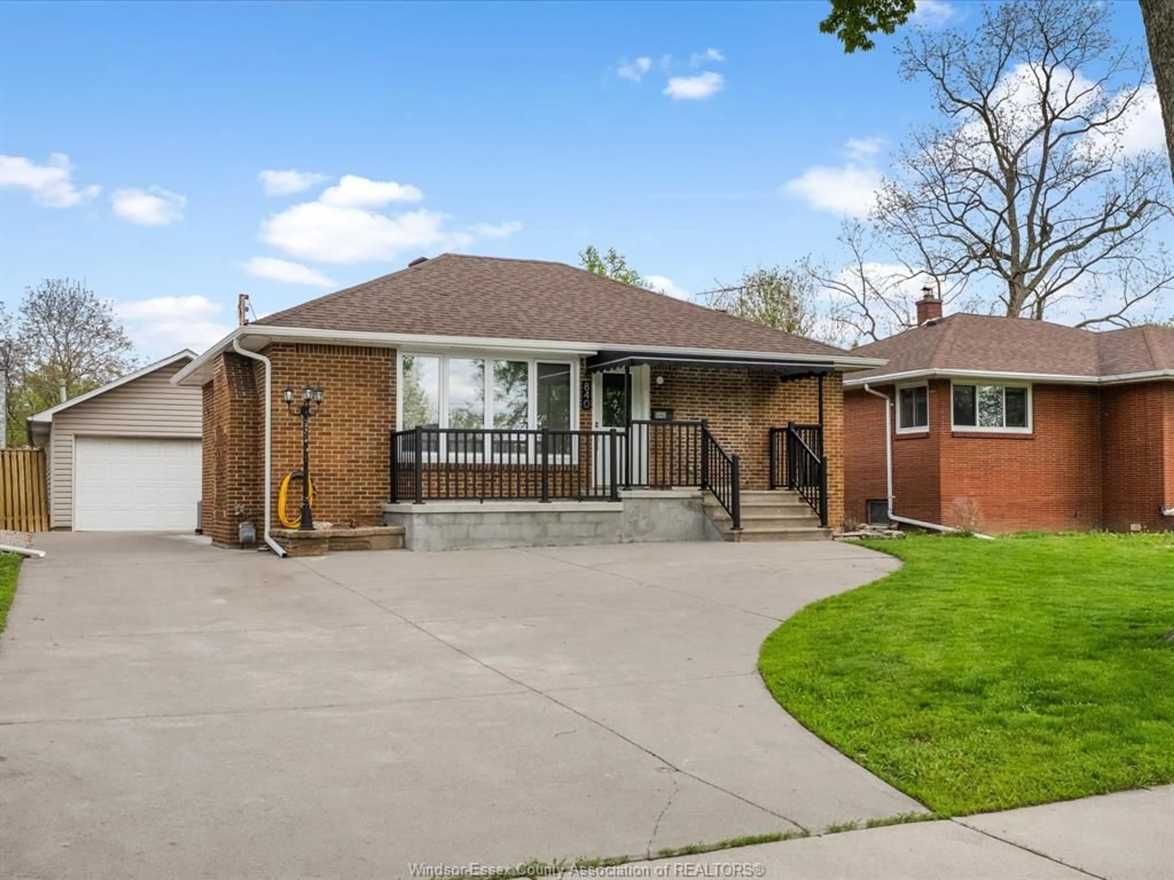 Home with brick exterior material, street for 840 ROSSINI Blvd, Windsor Ontario N8Y 2Z3
