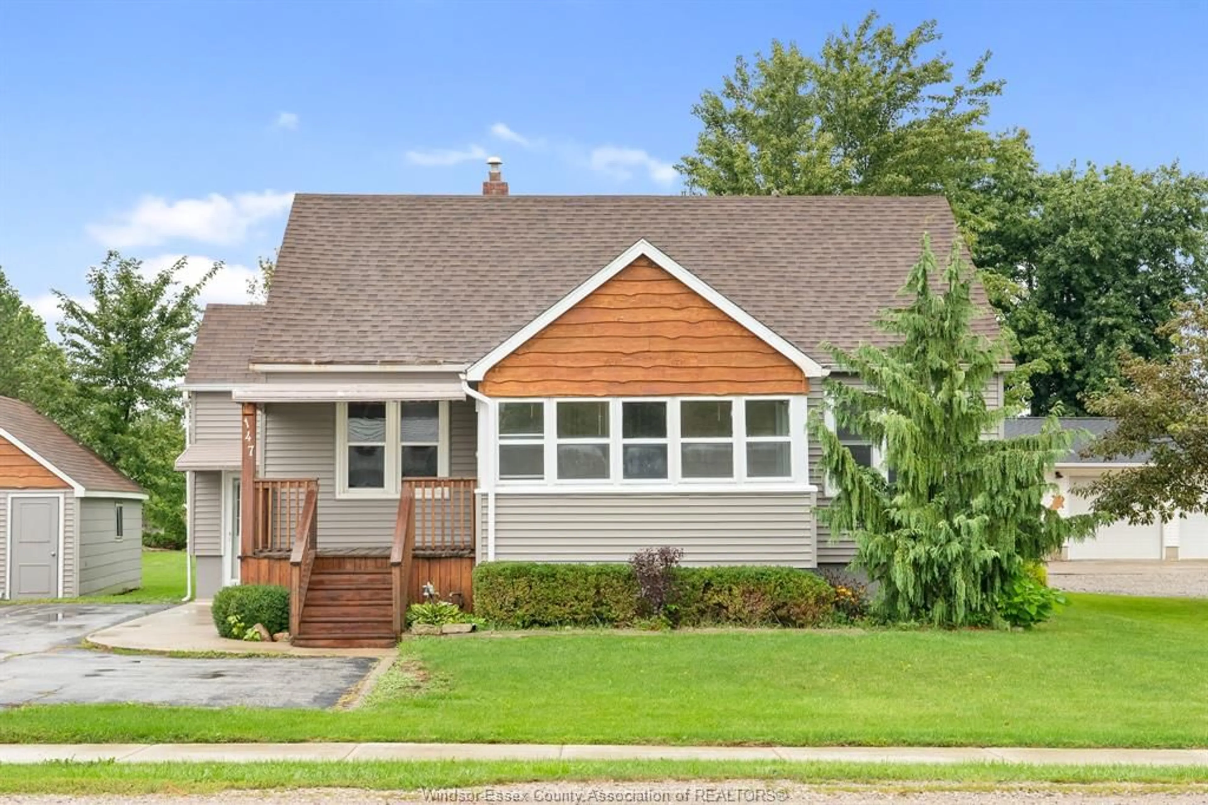 Home with vinyl exterior material, street for 147 County Road 27, Cottam Ontario N0R 1B0