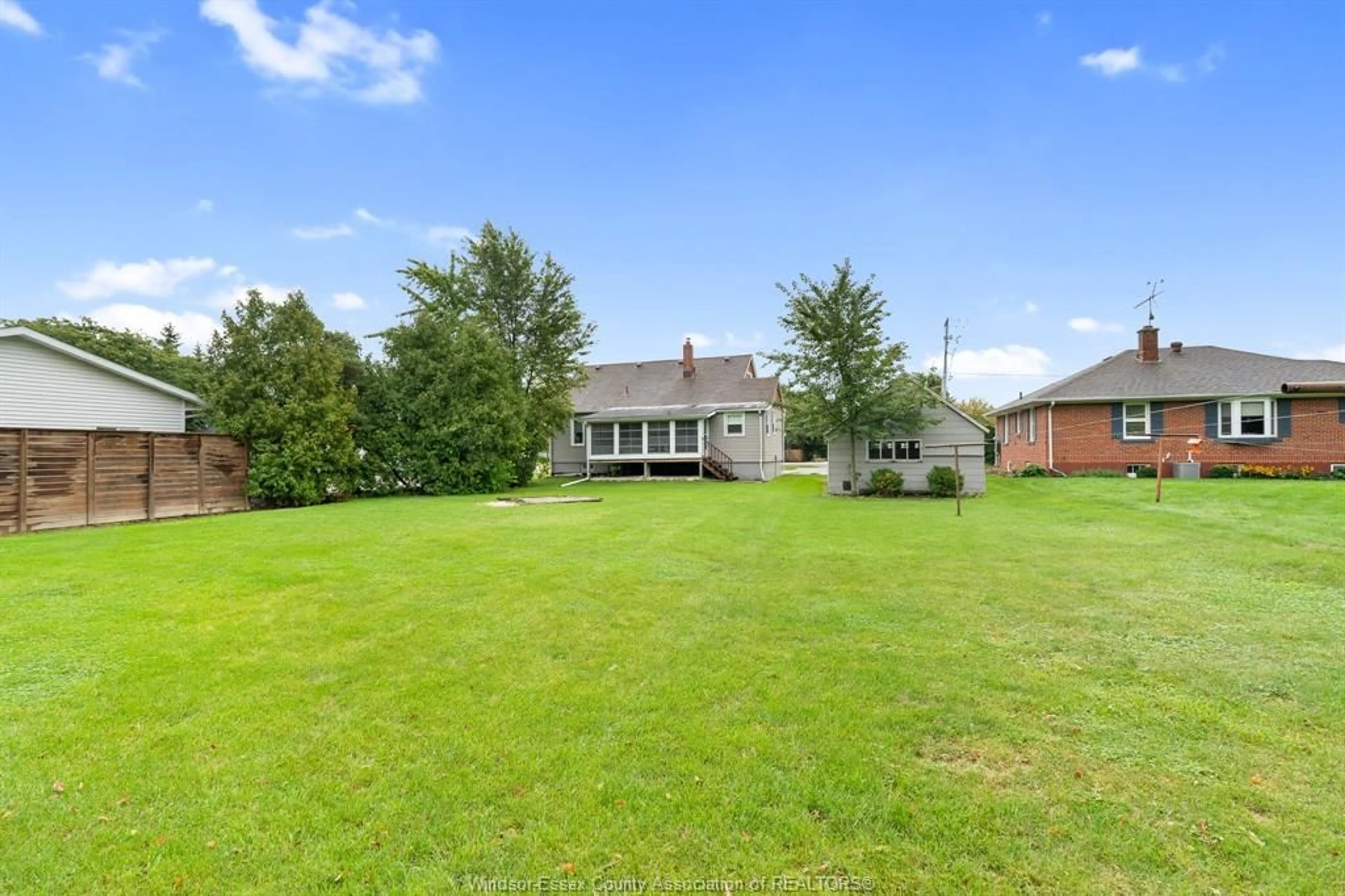 A pic from outside/outdoor area/front of a property/back of a property/a pic from drone, unknown for 147 County Road 27, Cottam Ontario N0R 1B0
