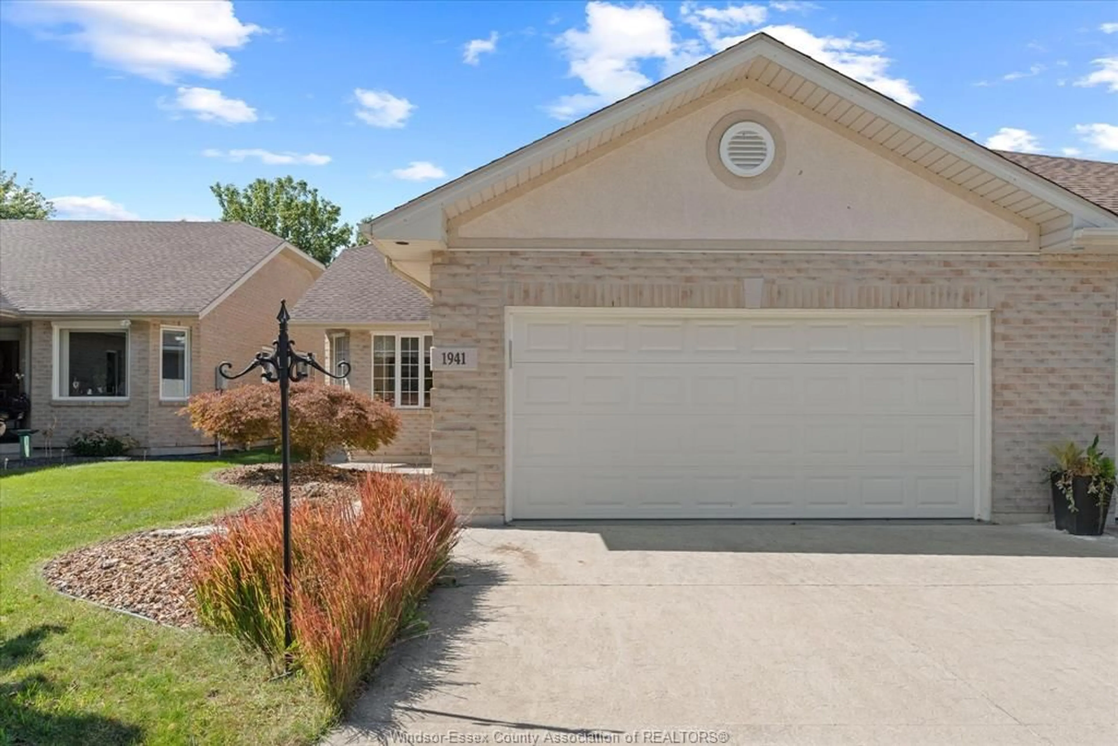 Home with vinyl exterior material, street for 1941 Blue Heron Dr, Windsor Ontario N8P 1P6