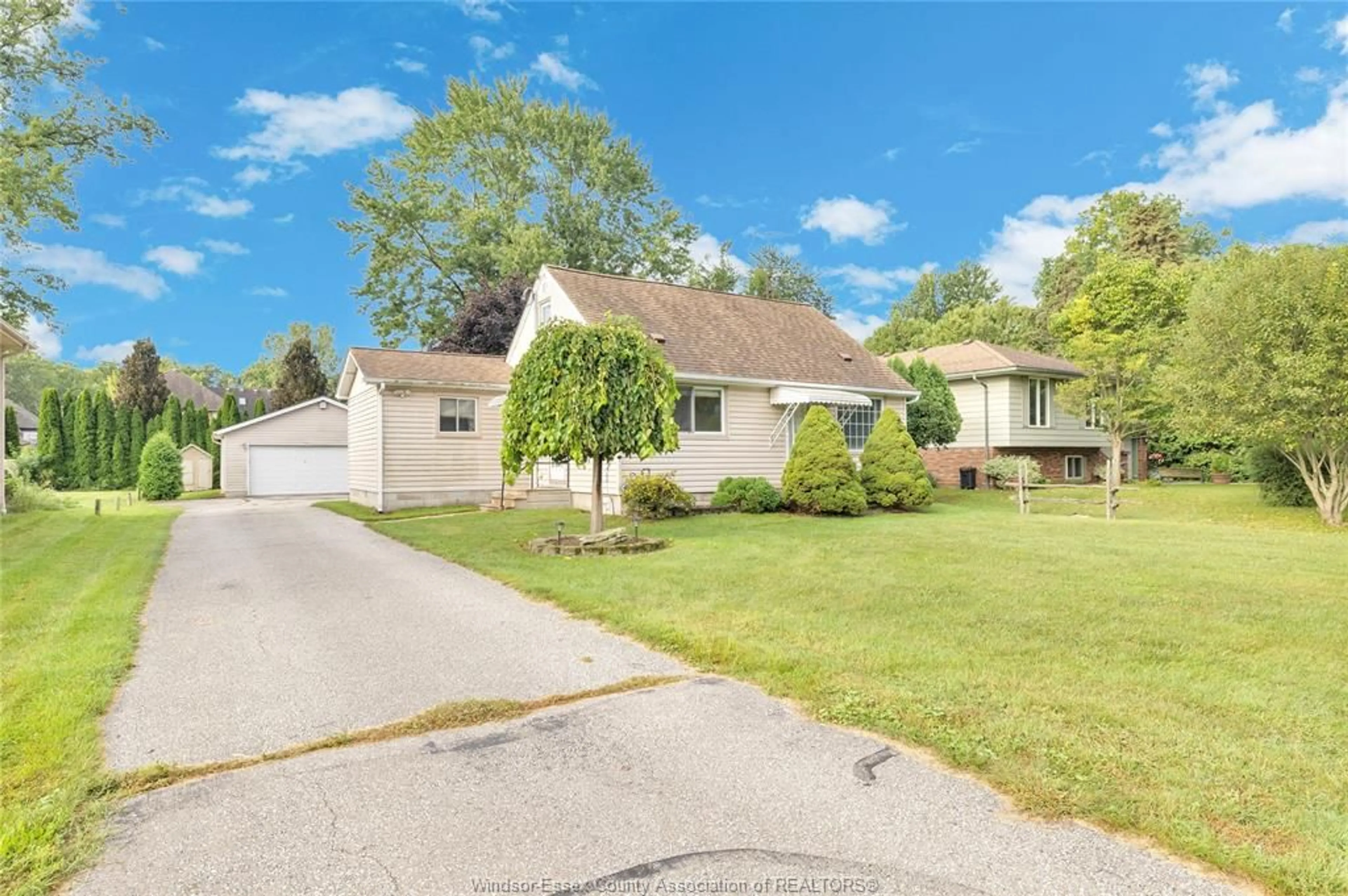 Home with vinyl exterior material, street for 1262 REAUME Rd, LaSalle Ontario N9J 1C1