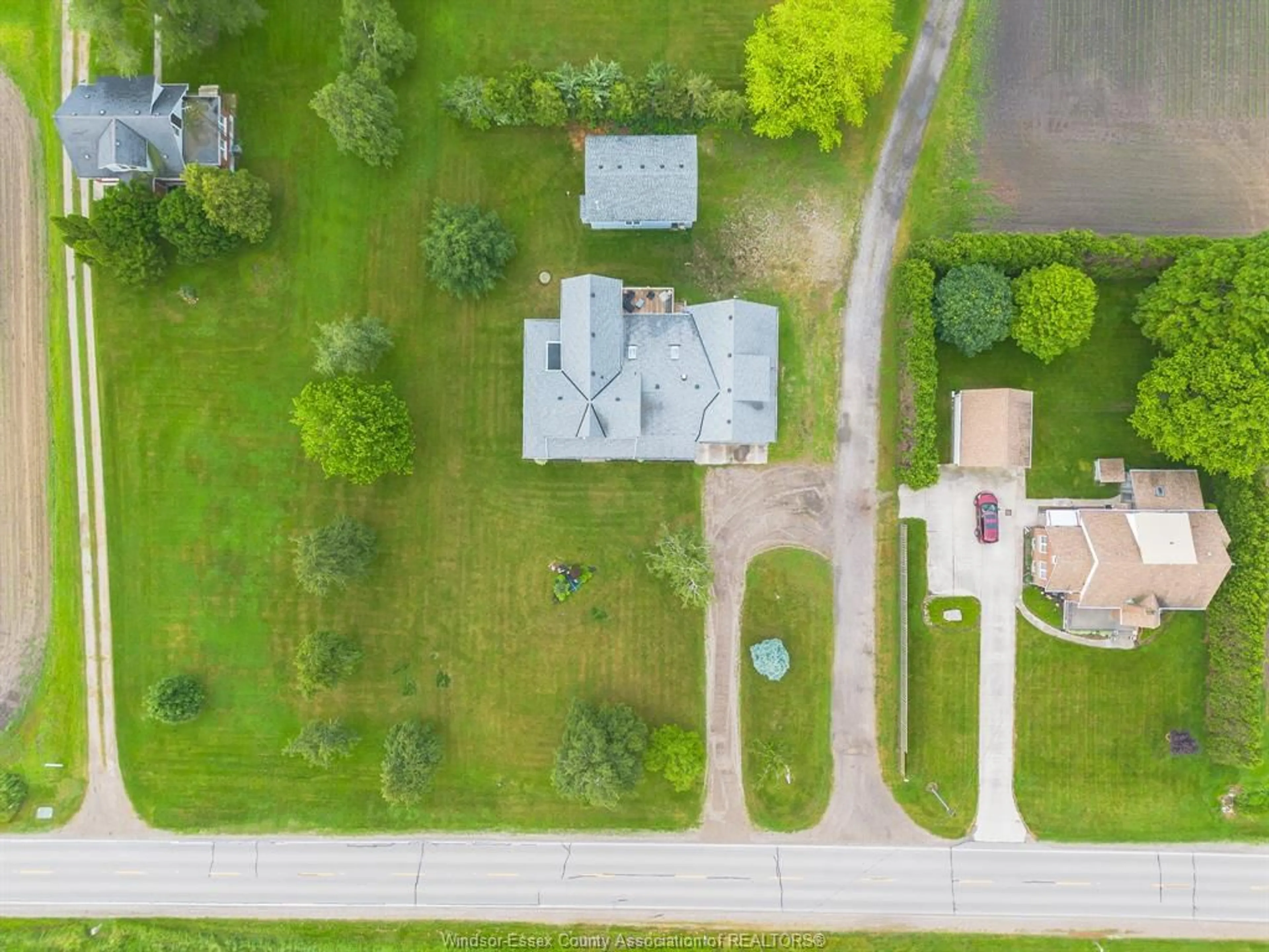 A pic from outside/outdoor area/front of a property/back of a property/a pic from drone, street for 18332 ERIEAU Rd, Chatham-Kent Ontario N0P 1A0