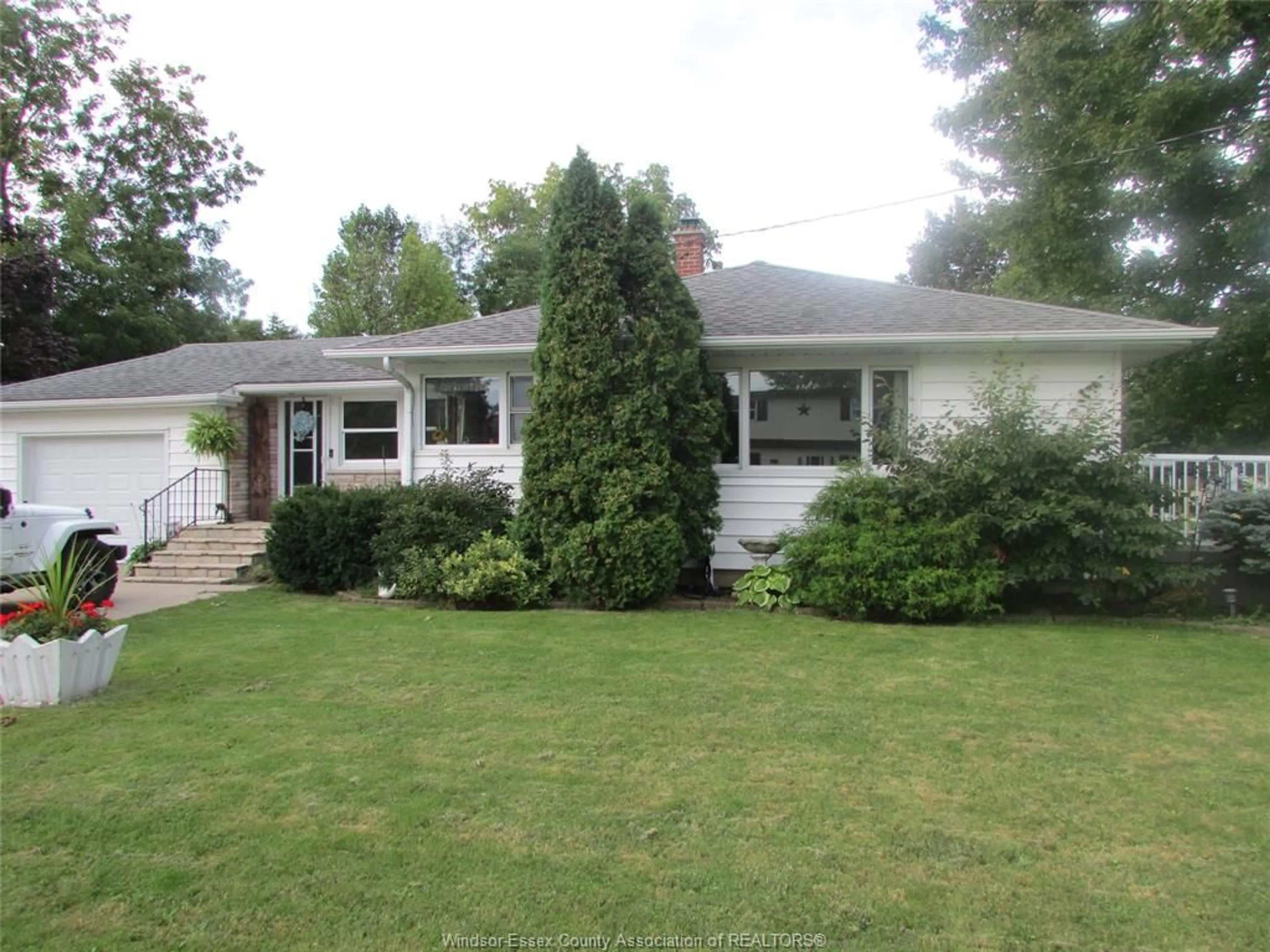 Home with vinyl exterior material, street for 127 Baird Ave, Wheatley Ontario N0P 2P0
