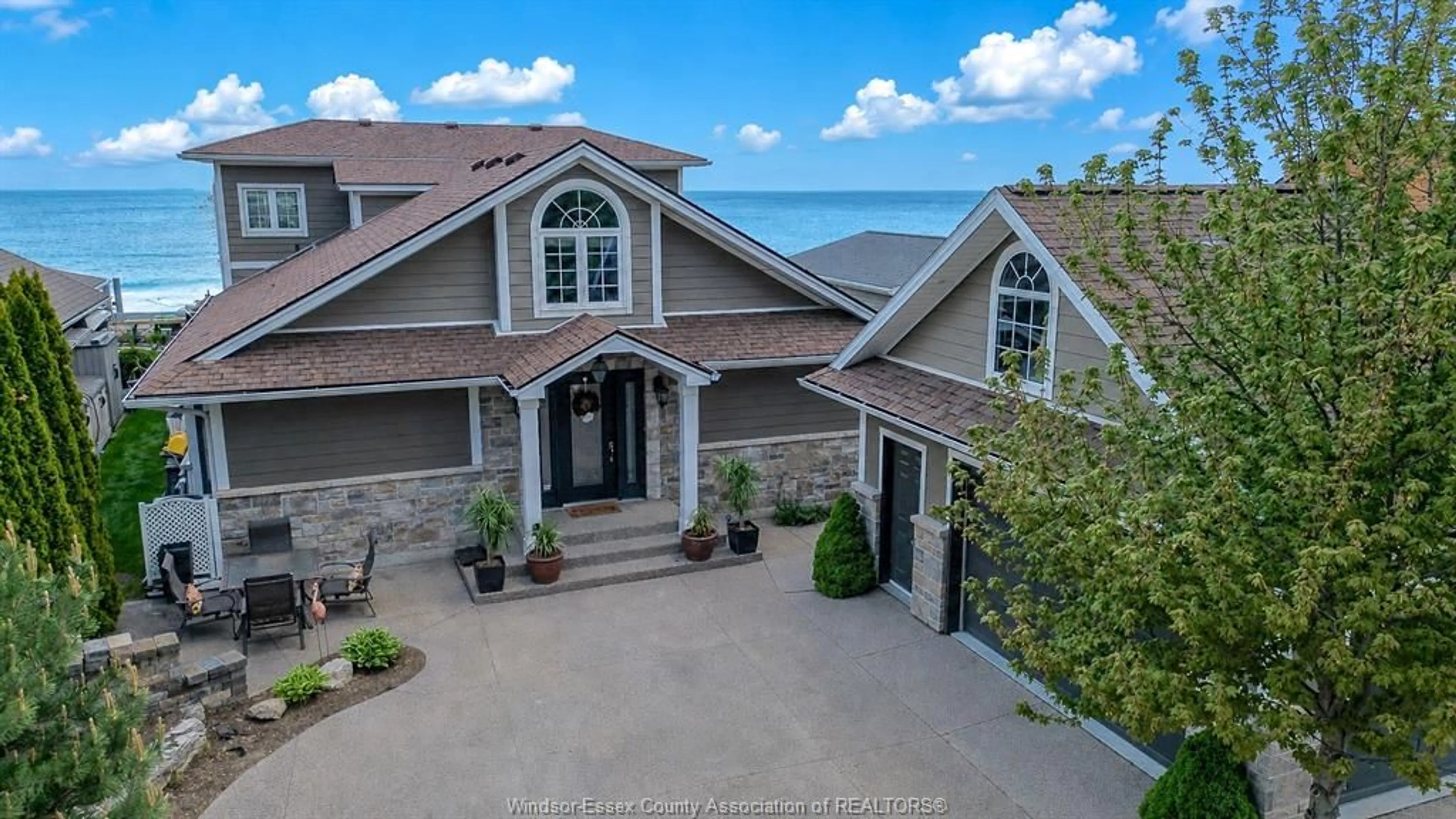 A pic from outside/outdoor area/front of a property/back of a property/a pic from drone, water/lake/river/ocean view for 1472 CAILLE, Lakeshore Ontario N8L 0J2