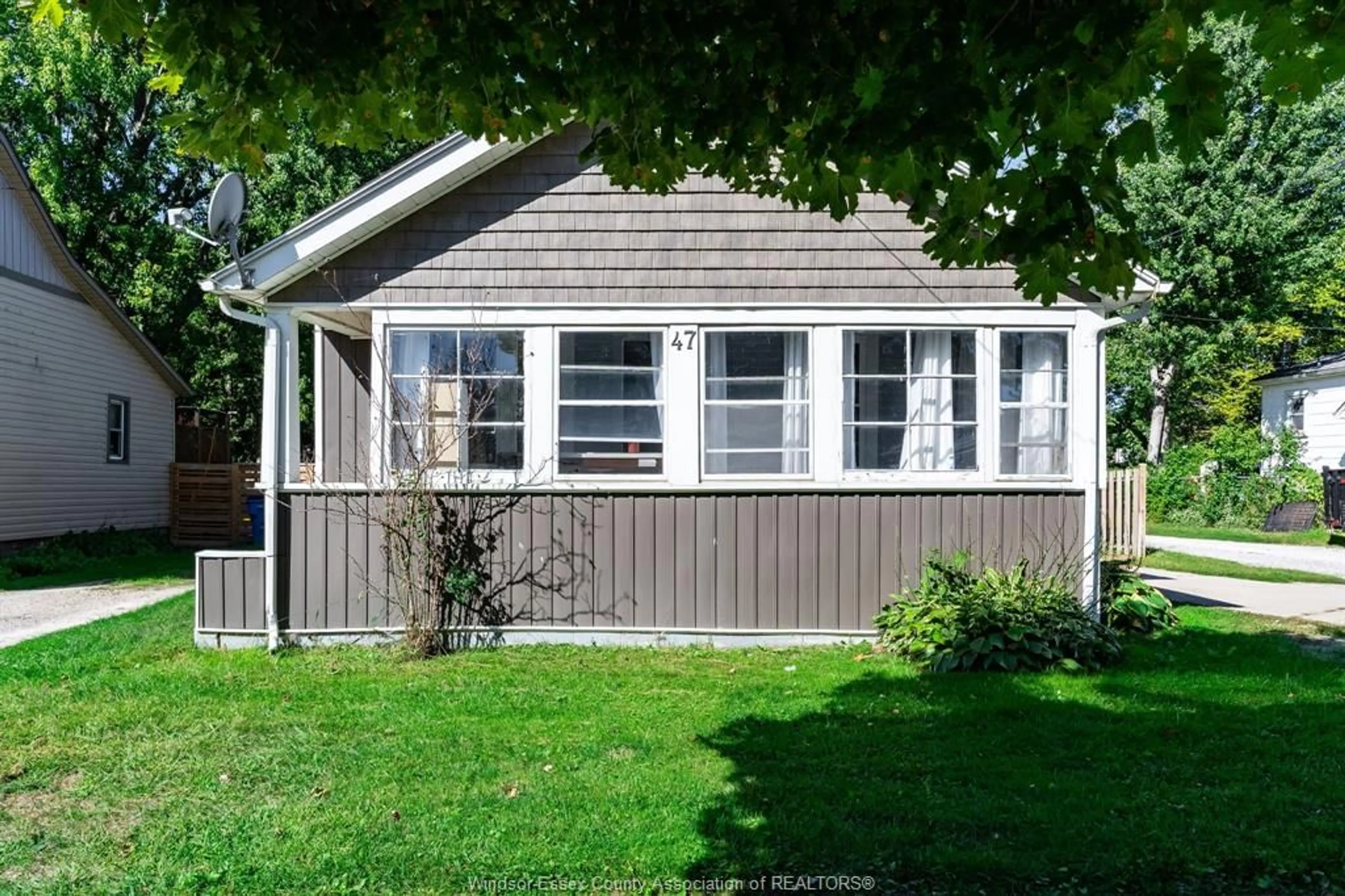 Home with vinyl exterior material, street for 47 Wigle St, Leamington Ontario N8H 2S8