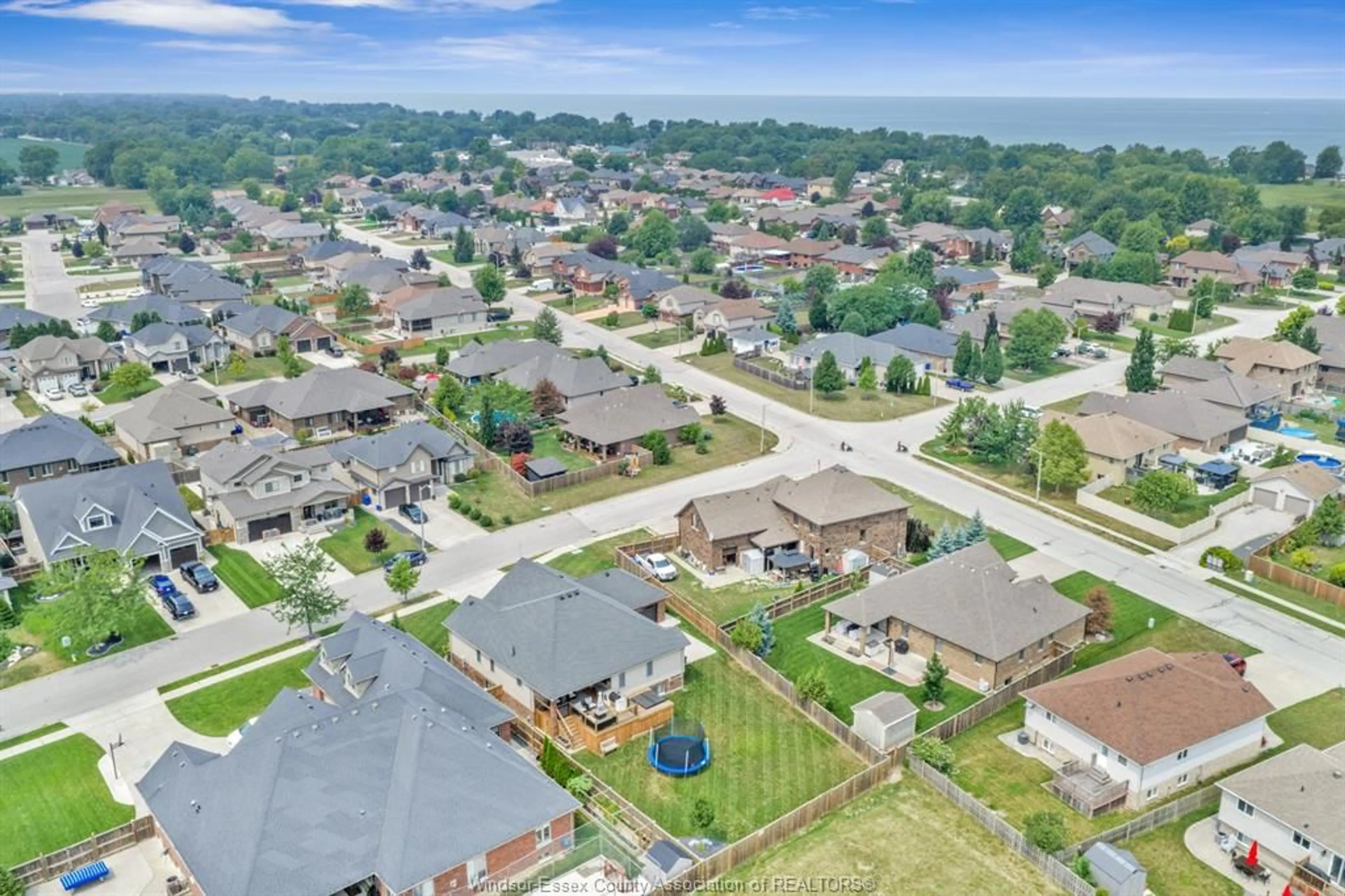 A pic from outside/outdoor area/front of a property/back of a property/a pic from drone, street for 1385 PASCAL Ave, Lakeshore Ontario N0R 1A0