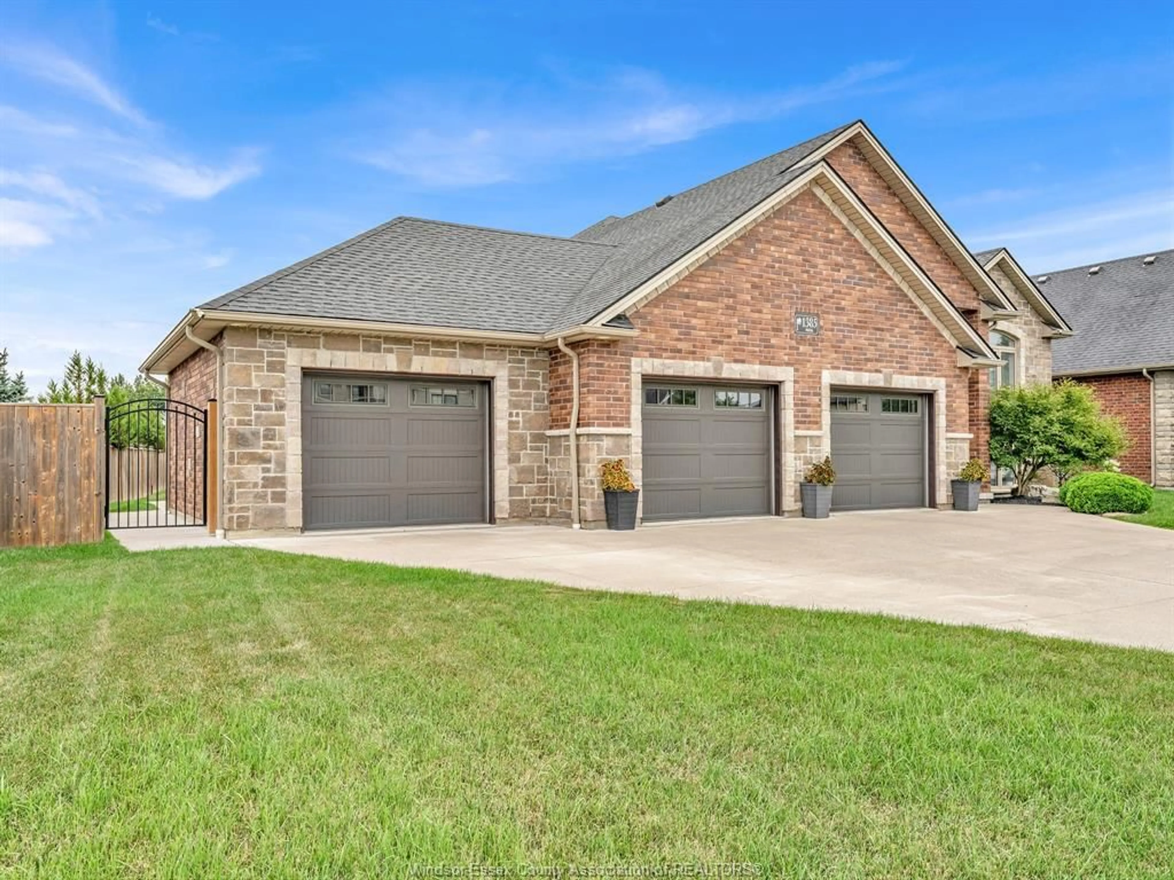 Home with brick exterior material, street for 1385 PASCAL Ave, Lakeshore Ontario N0R 1A0