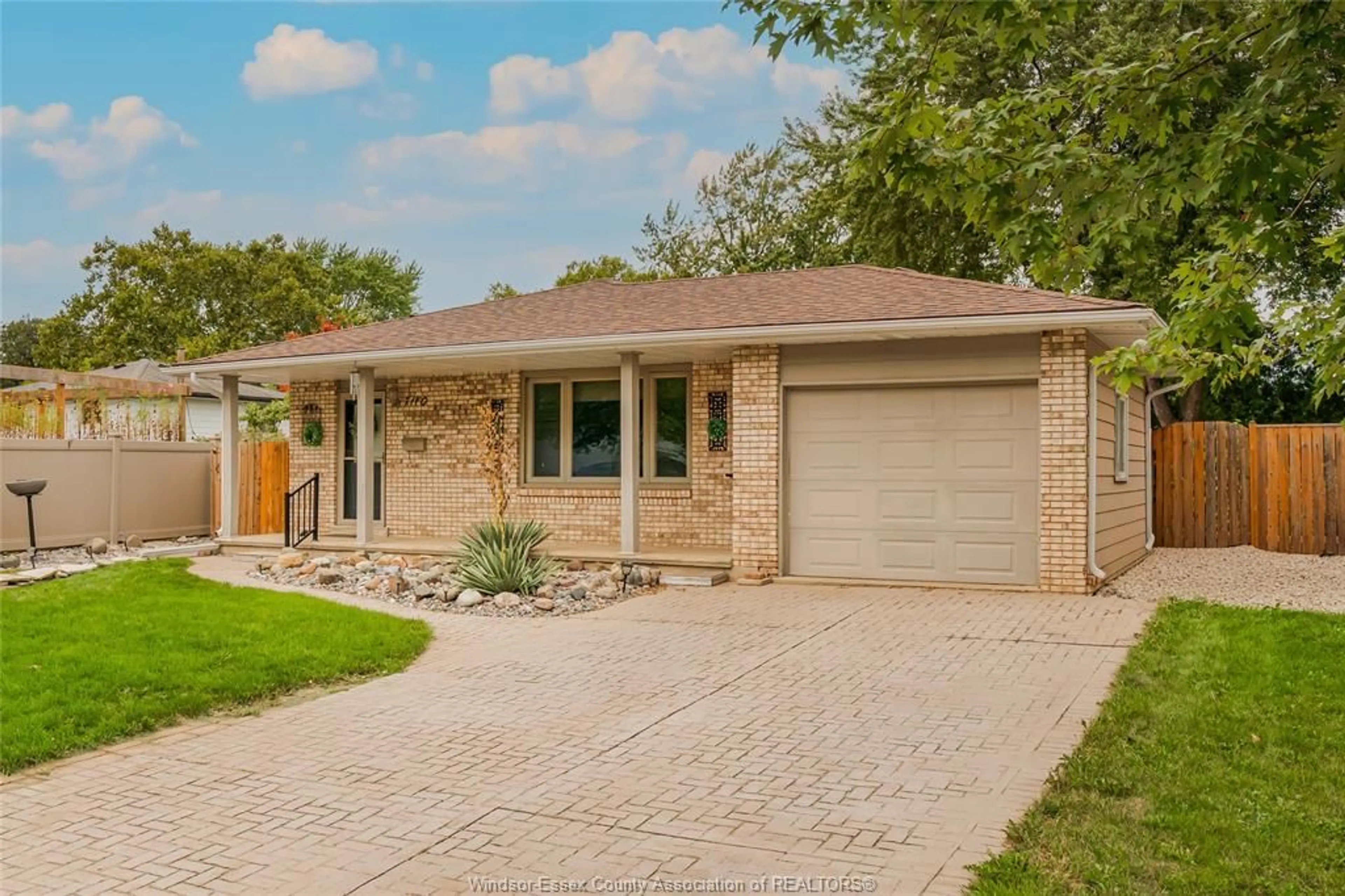 Home with brick exterior material, street for 7110 Isabelle Crt, Windsor Ontario N8S 4J7
