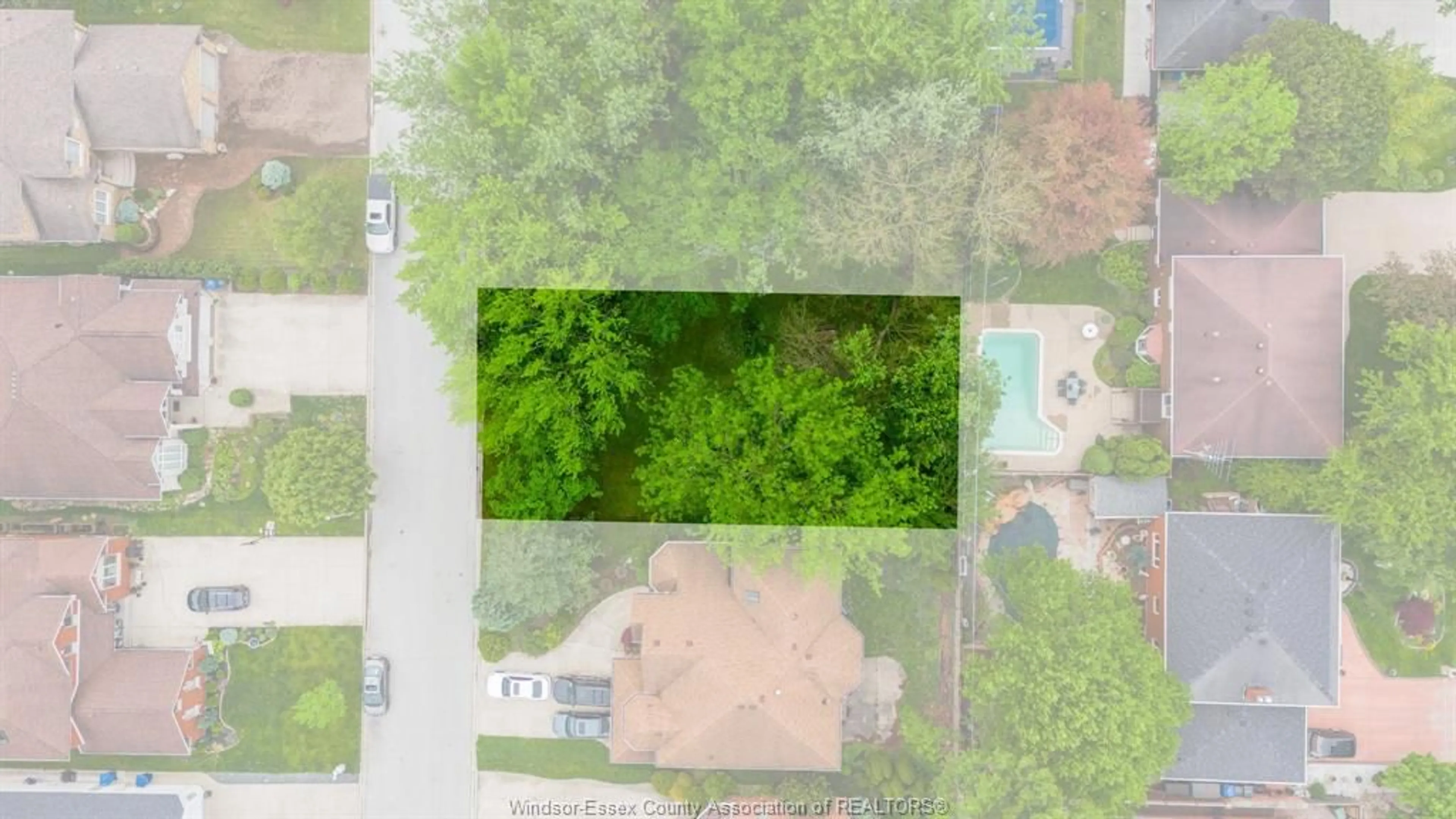 A pic from outside/outdoor area/front of a property/back of a property/a pic from drone, forest/trees view for 3691 Inglewood Ave, Windsor Ontario N9E 4P3