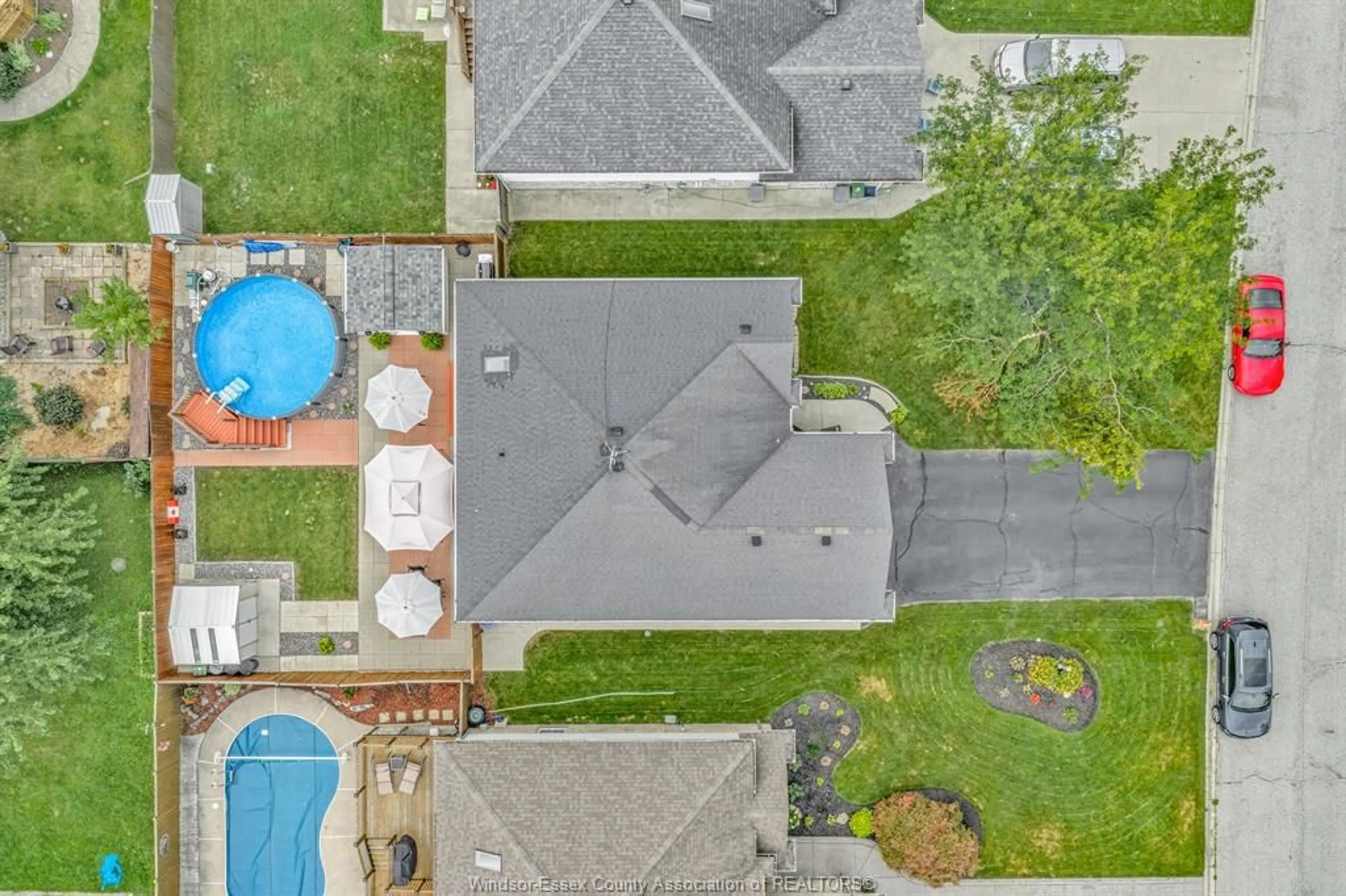 A pic from outside/outdoor area/front of a property/back of a property/a pic from drone, street for 2575 WILDBERRY, Tecumseh Ontario N9K 1C2