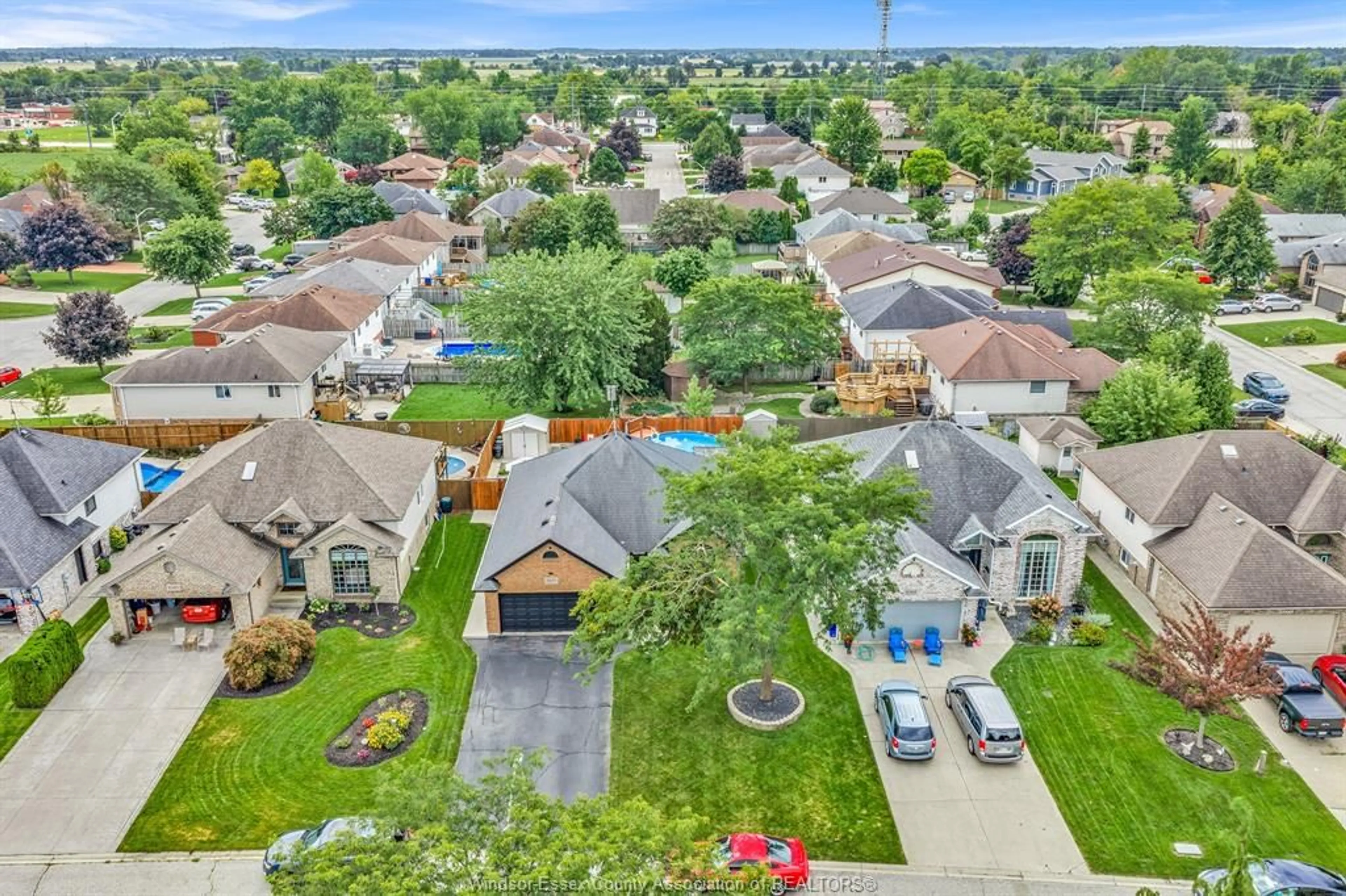 A pic from outside/outdoor area/front of a property/back of a property/a pic from drone, street for 2575 WILDBERRY, Tecumseh Ontario N9K 1C2