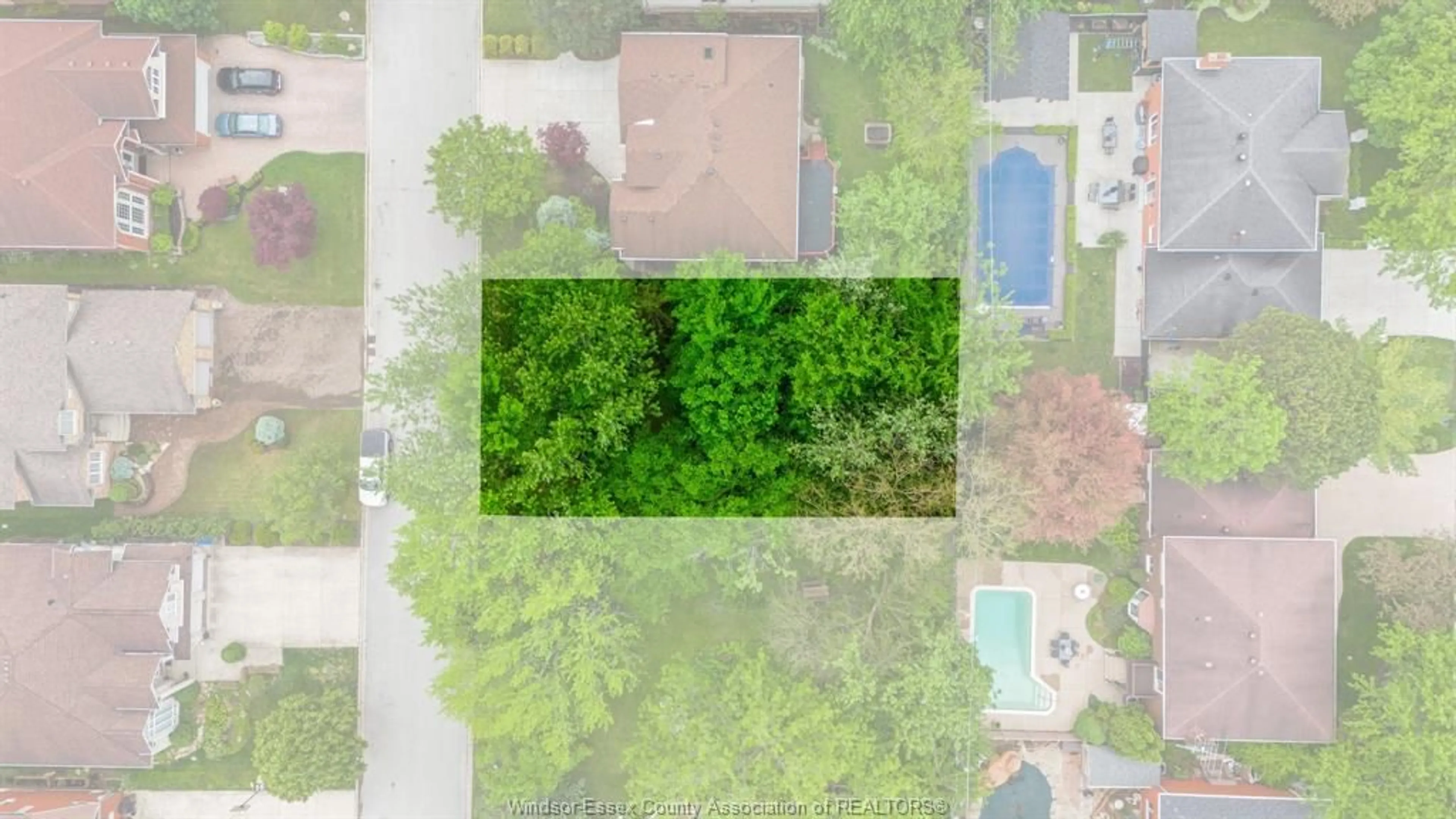 A pic from outside/outdoor area/front of a property/back of a property/a pic from drone, forest/trees view for 3699 Inglewood Ave, Windsor Ontario N9E 4P3