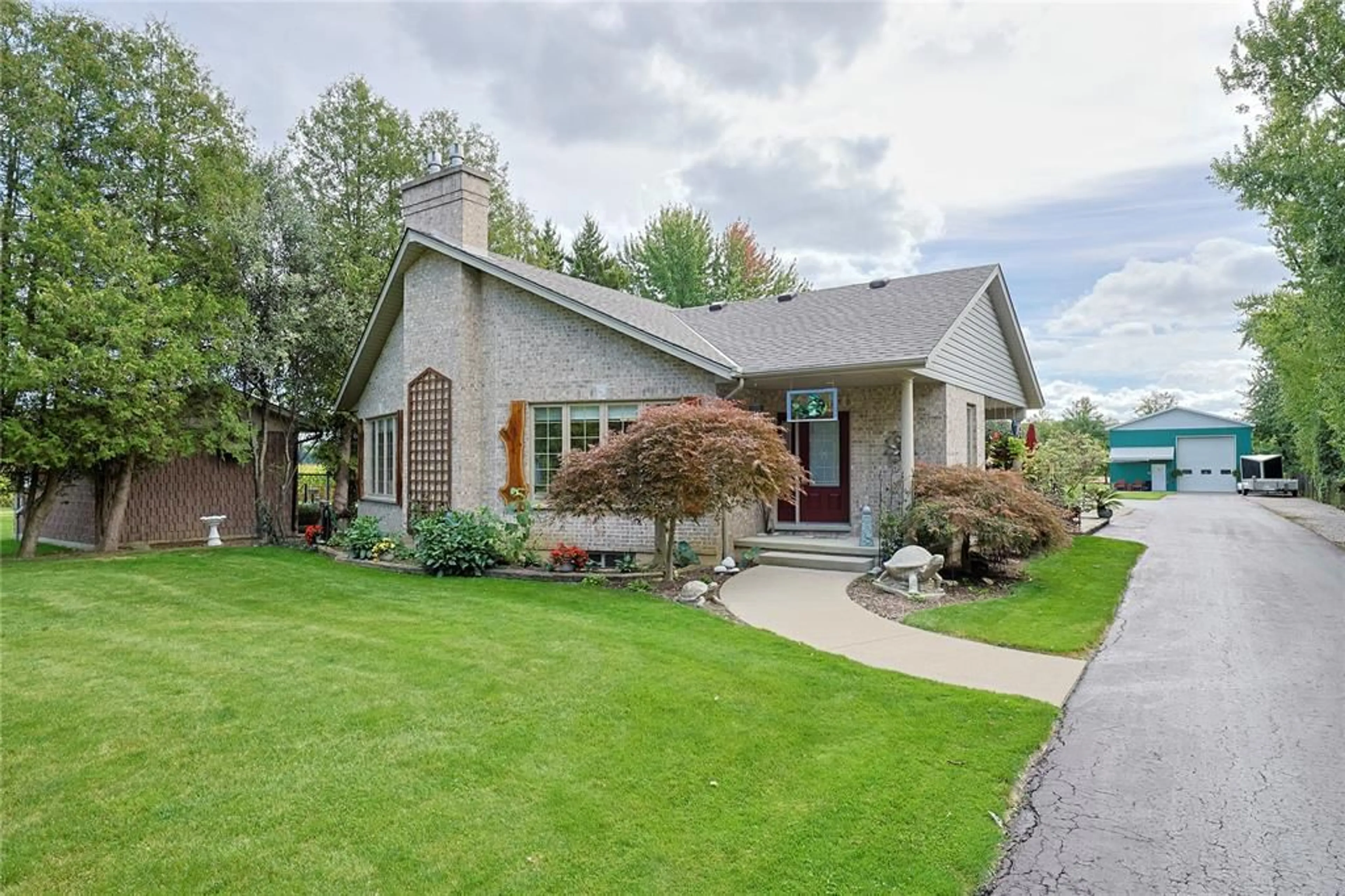 Home with brick exterior material, street for 5121 Lakeshore Rd, Plympton-Wyoming Ontario N0N 1J6