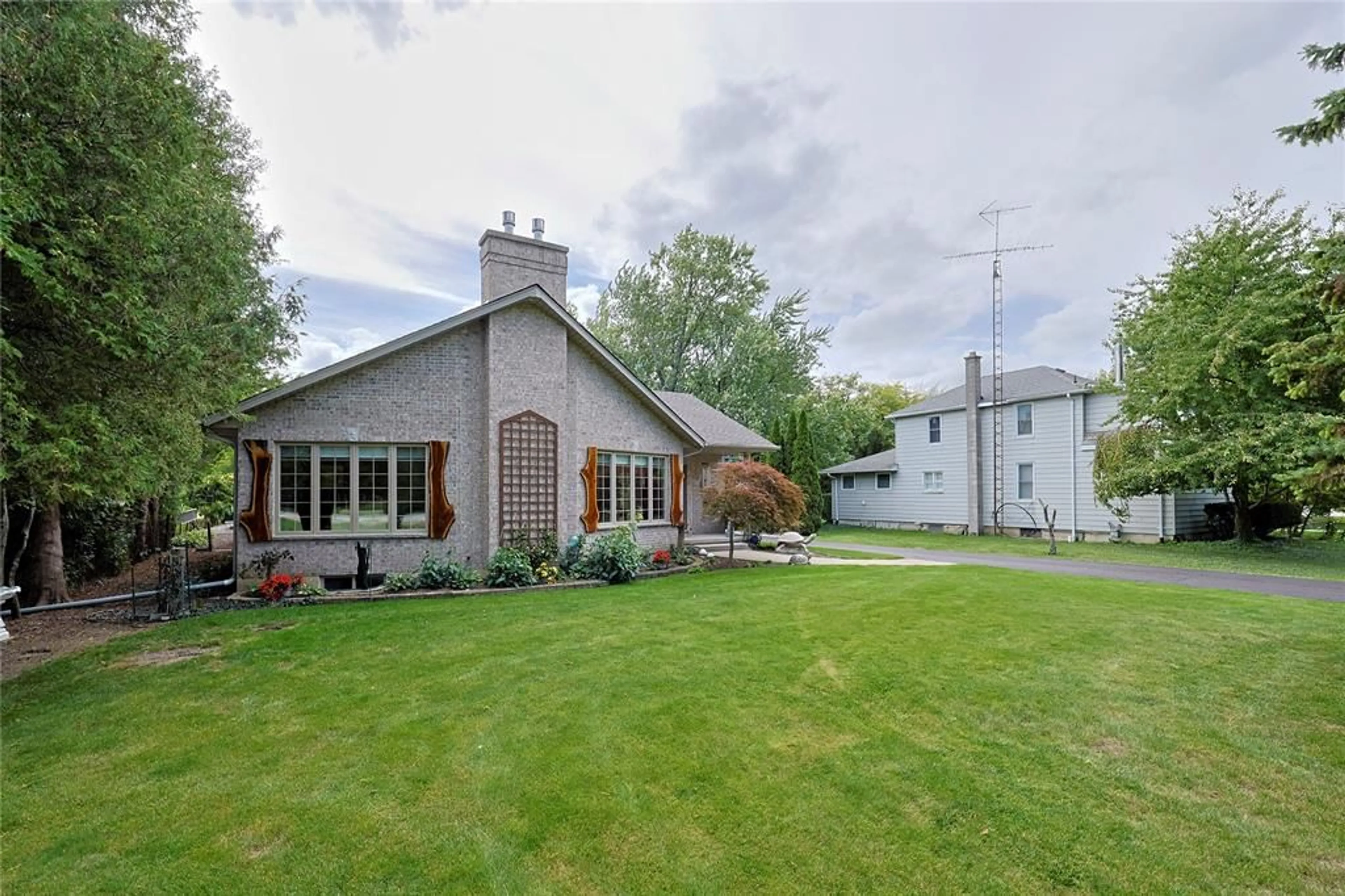 A pic from outside/outdoor area/front of a property/back of a property/a pic from drone, unknown for 5121 Lakeshore Rd, Plympton-Wyoming Ontario N0N 1J6