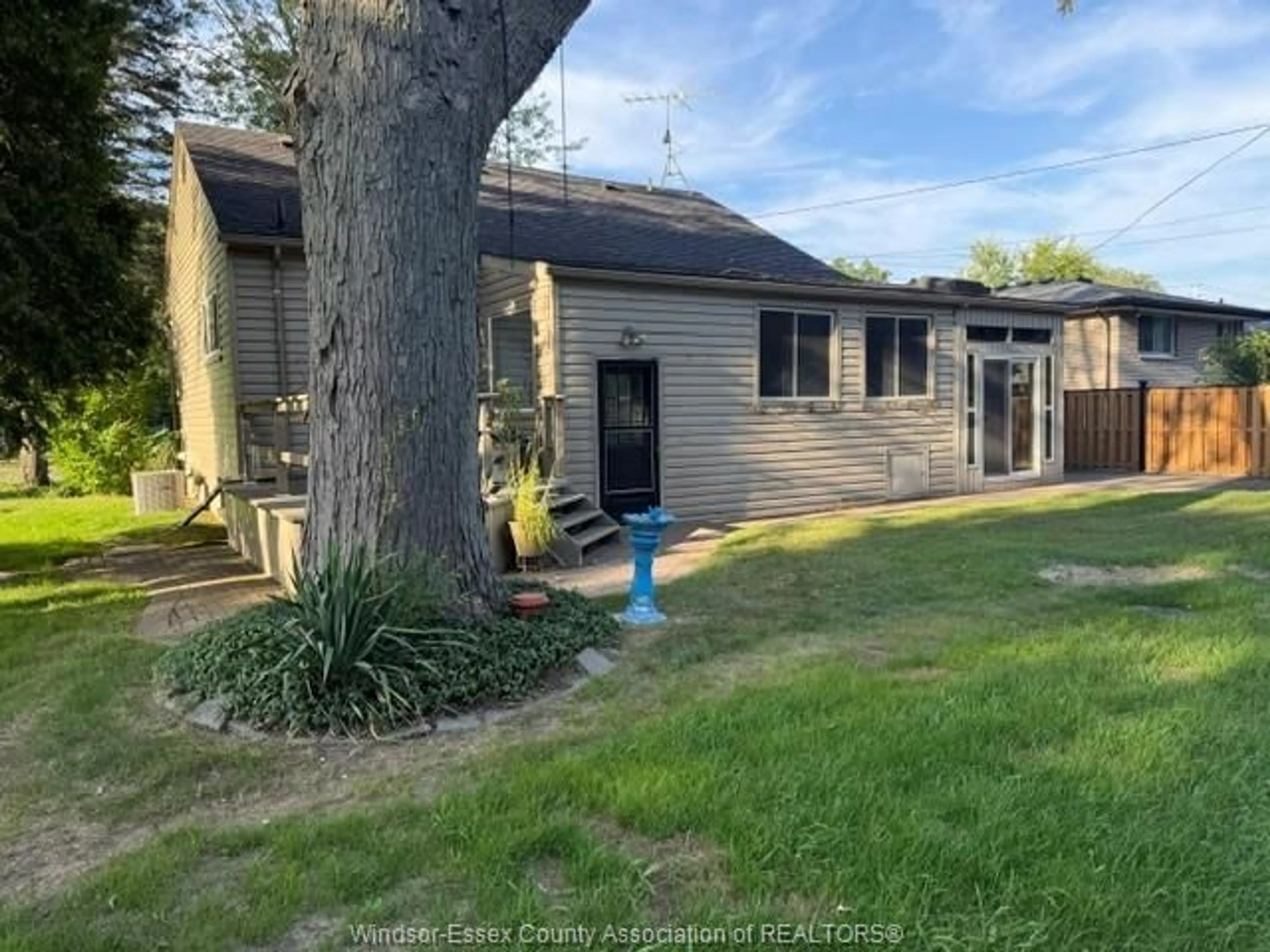 A pic from outside/outdoor area/front of a property/back of a property/a pic from drone, street for 2115 TODD Lane, LaSalle Ontario N9H 1L6
