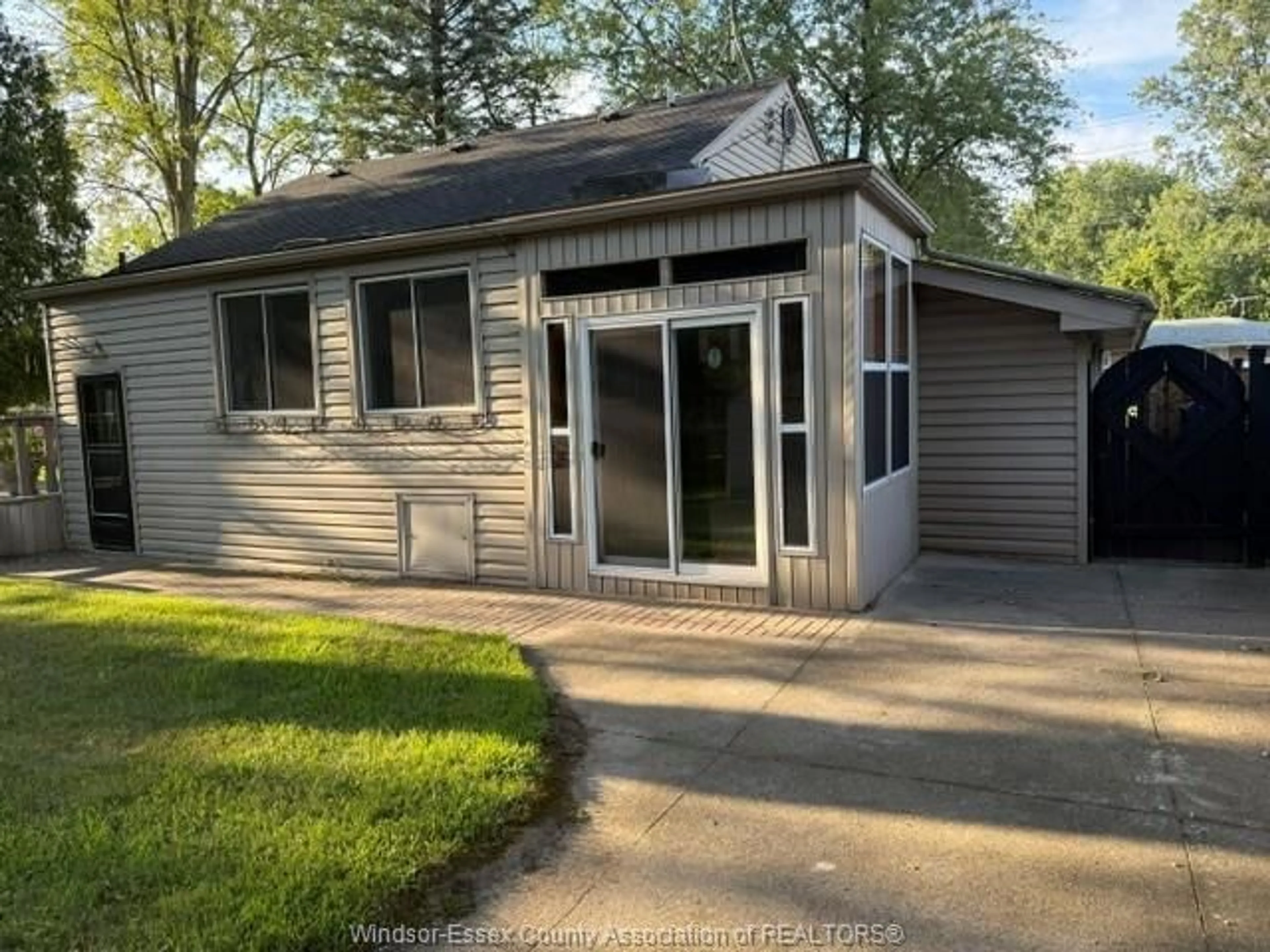 Home with vinyl exterior material, street for 2115 TODD Lane, LaSalle Ontario N9H 1L6