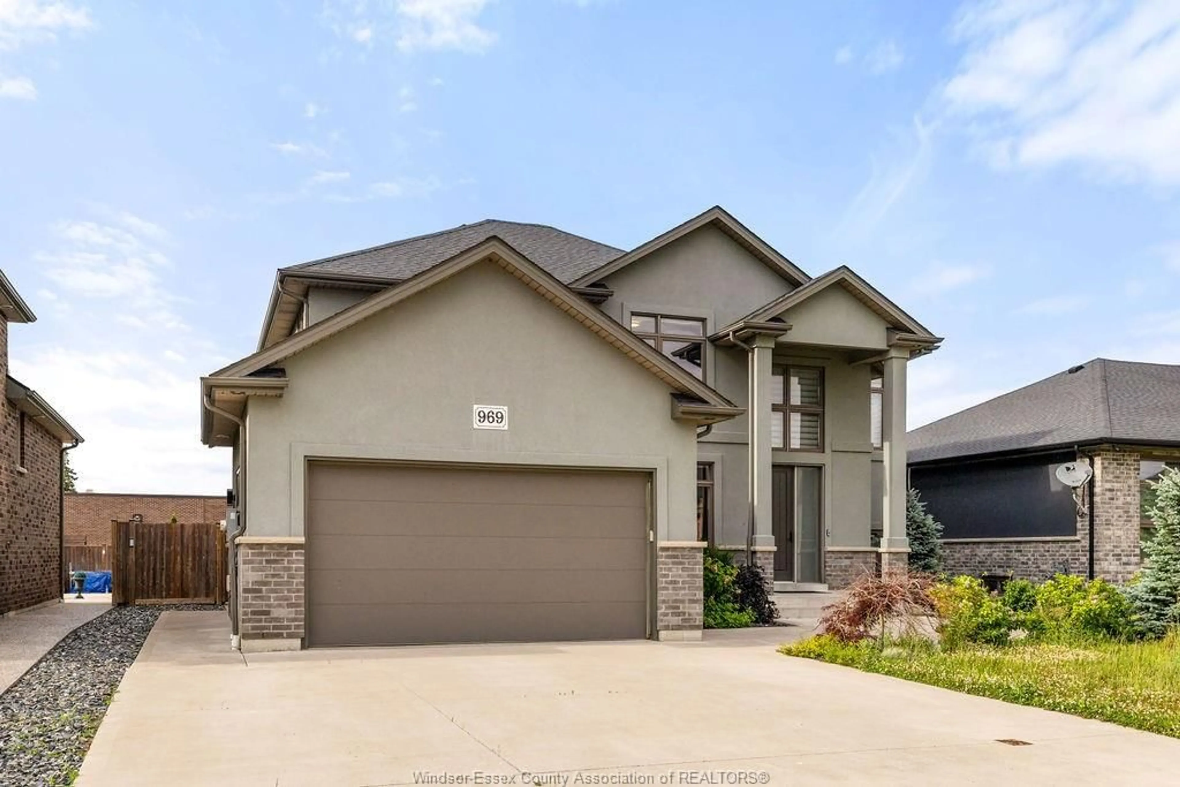 Home with brick exterior material, street for 969 WESTWOOD Dr, Lakeshore Ontario N0R 1A0