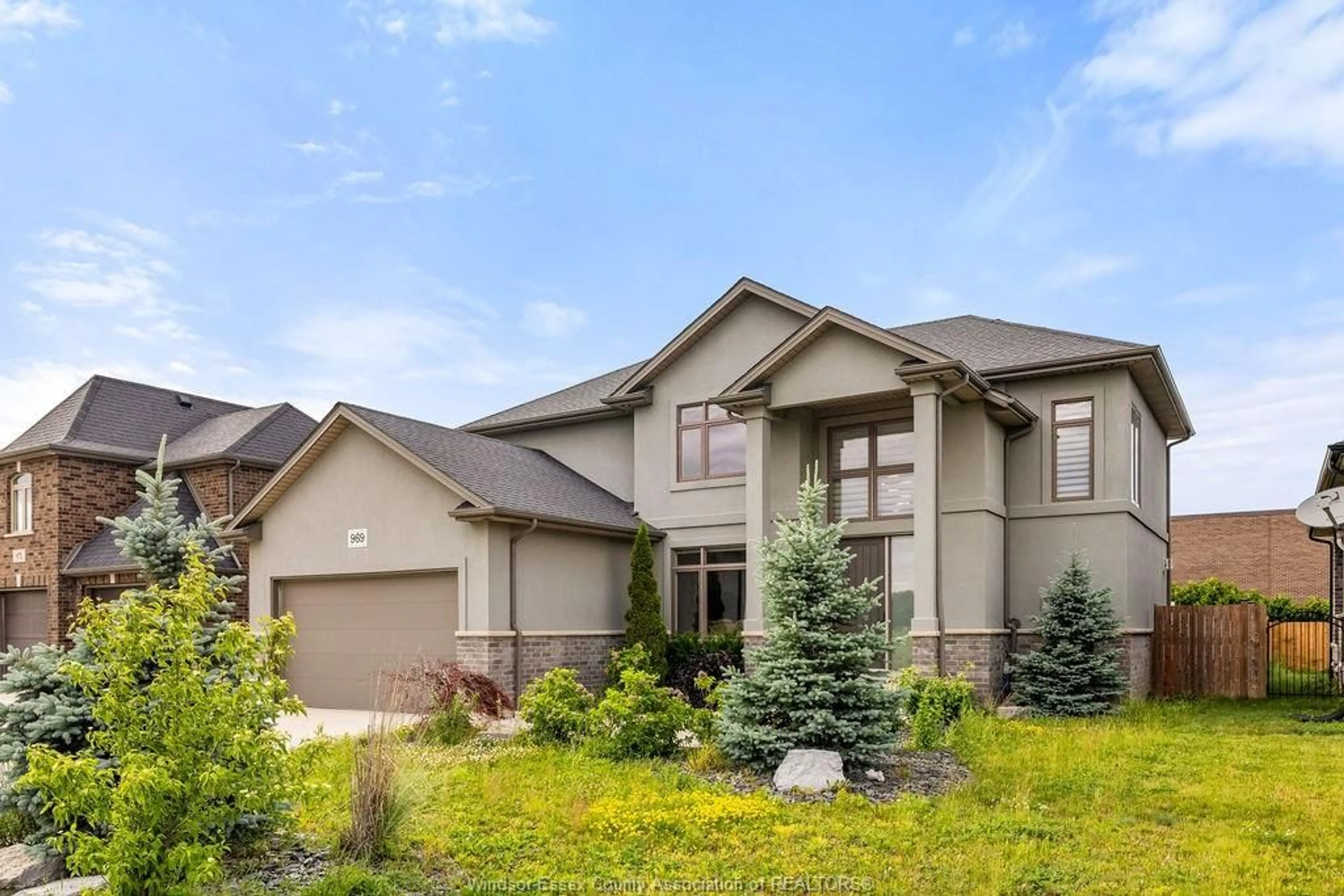 Home with vinyl exterior material, street for 969 WESTWOOD Dr, Lakeshore Ontario N0R 1A0