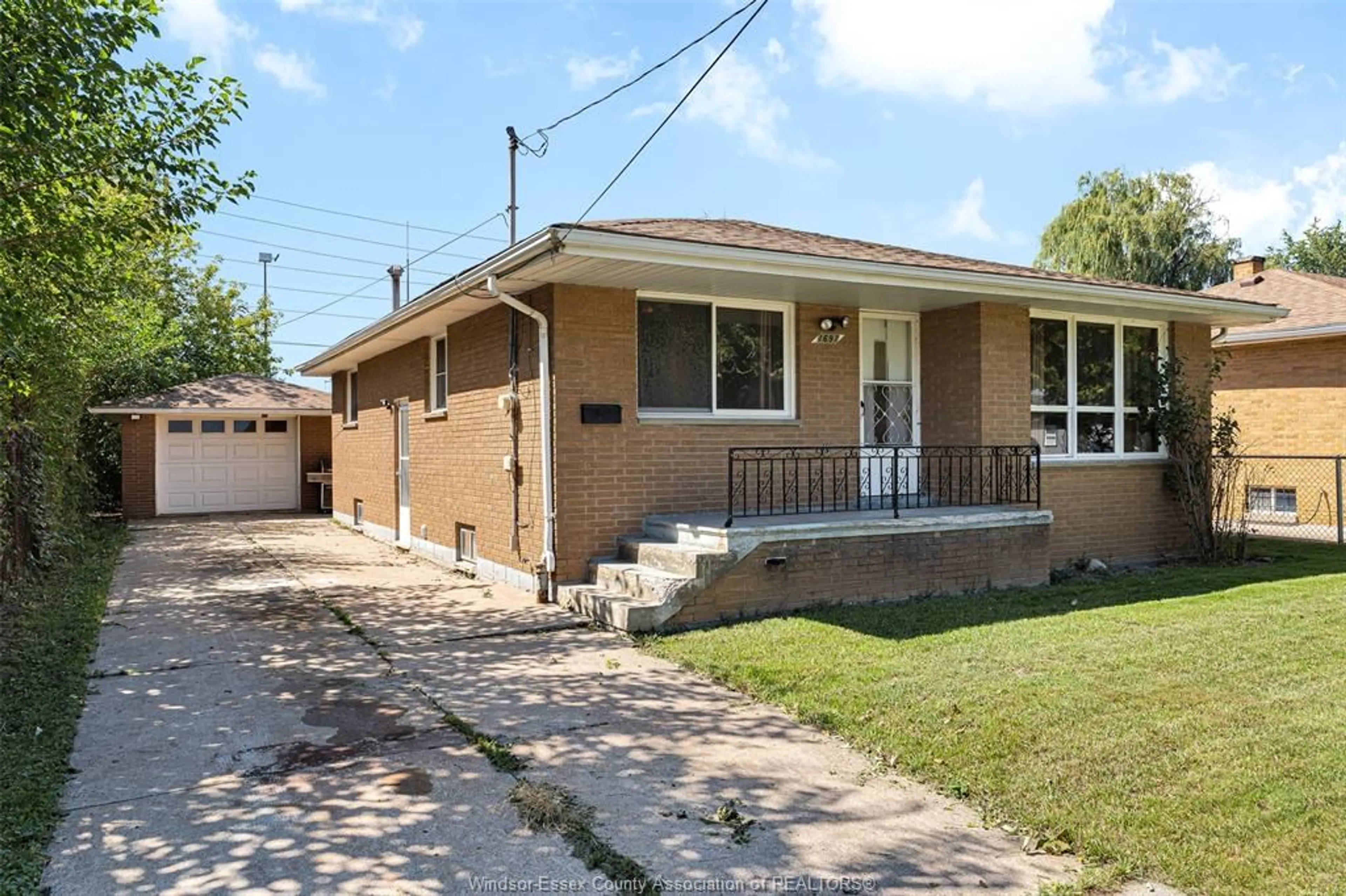 Home with brick exterior material, street for 1697 FACTORIA Rd, Windsor Ontario N8Y 2P1