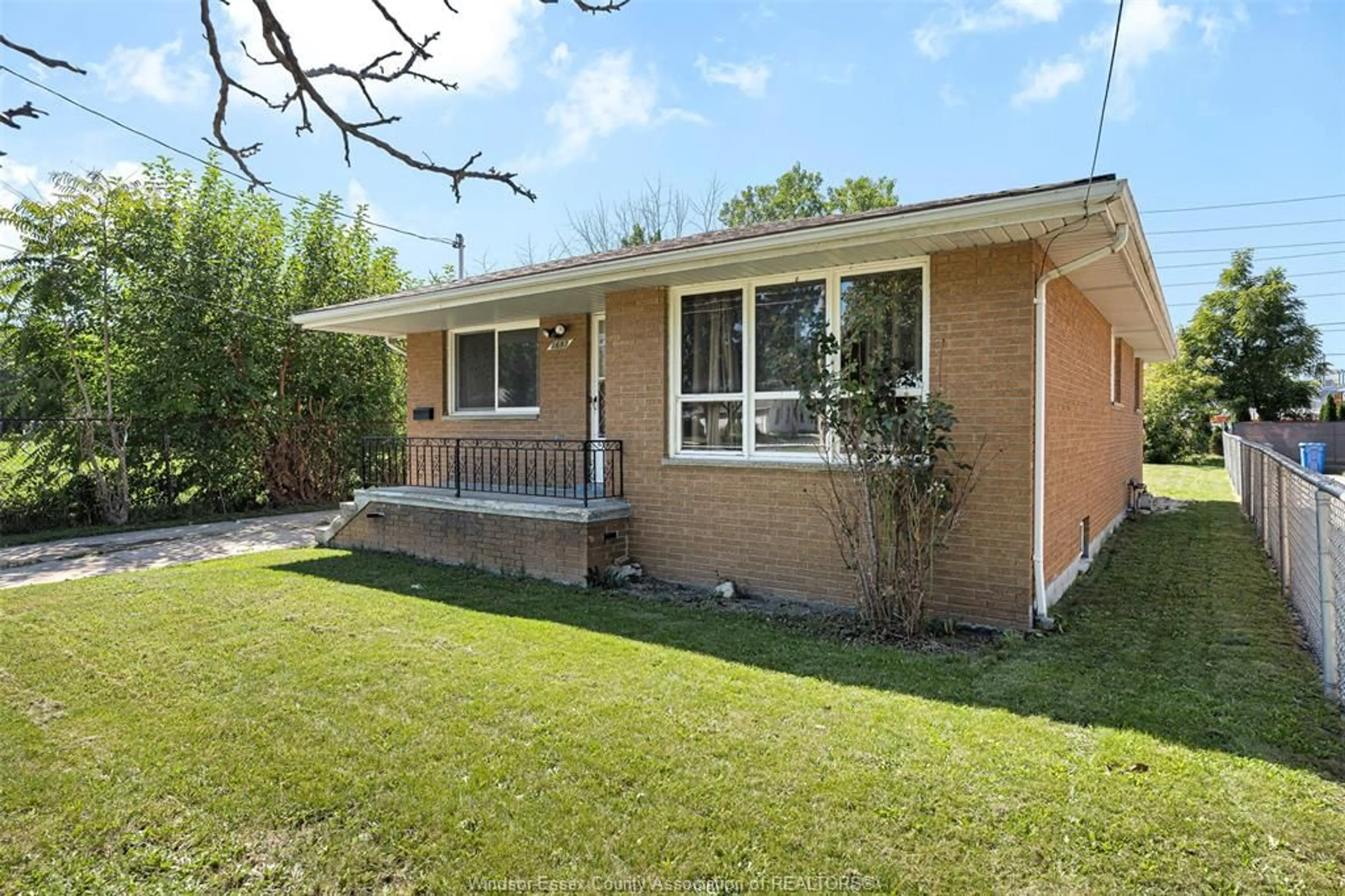 Home with brick exterior material, street for 1697 FACTORIA Rd, Windsor Ontario N8Y 2P1