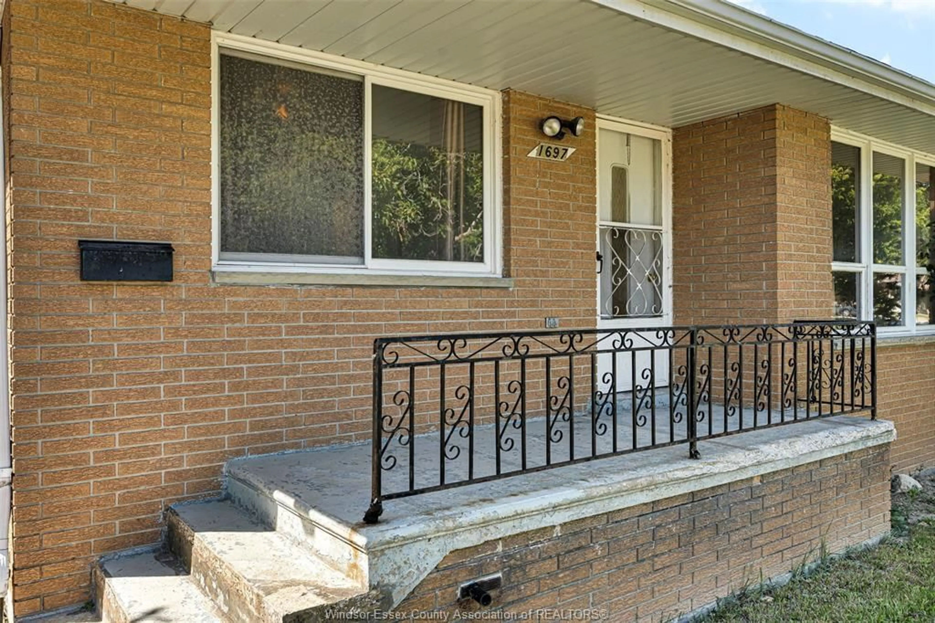 Home with brick exterior material, street for 1697 FACTORIA Rd, Windsor Ontario N8Y 2P1