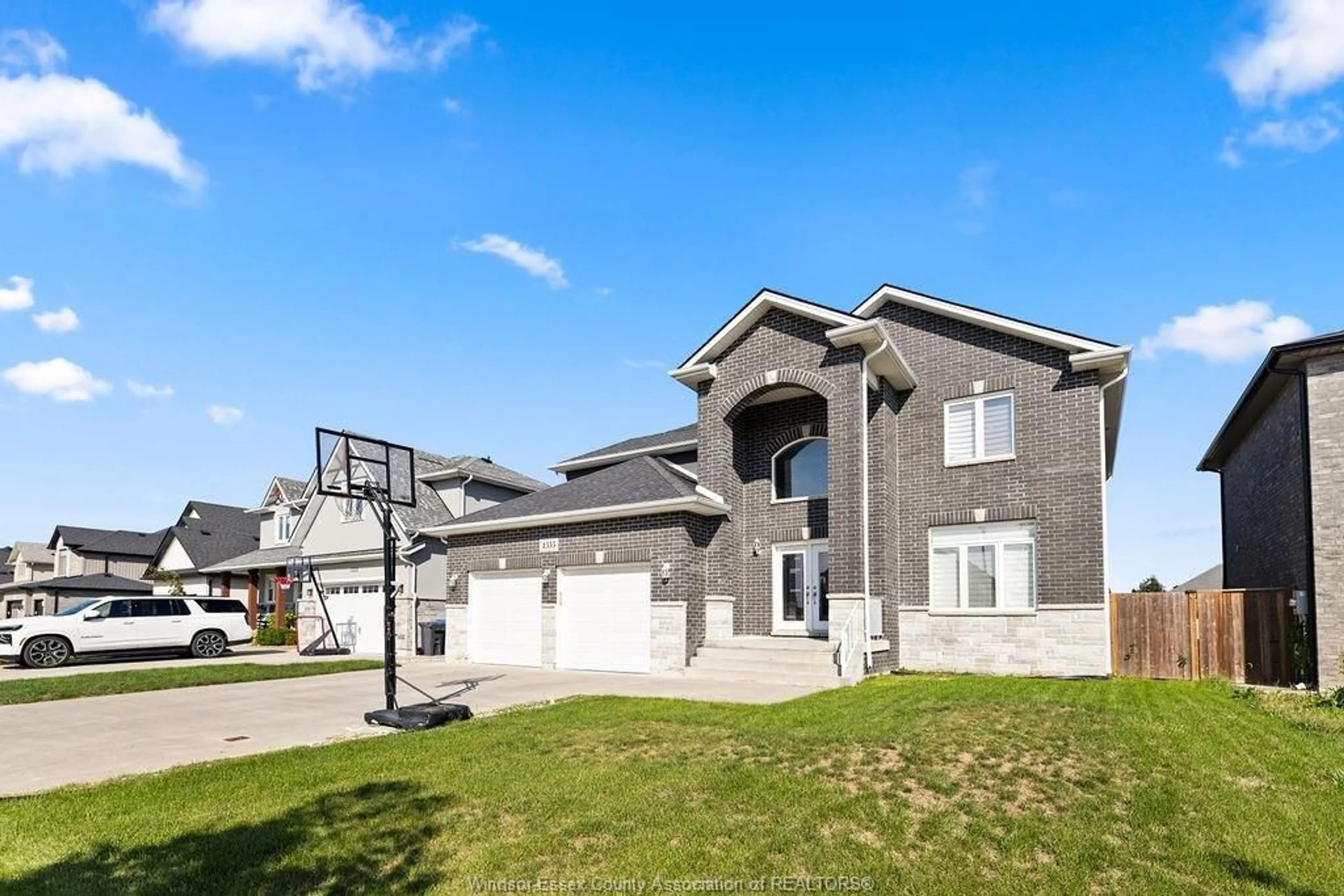 Home with vinyl exterior material, street for 1353 PASCAL Ave, Lakeshore Ontario N0R 1A0