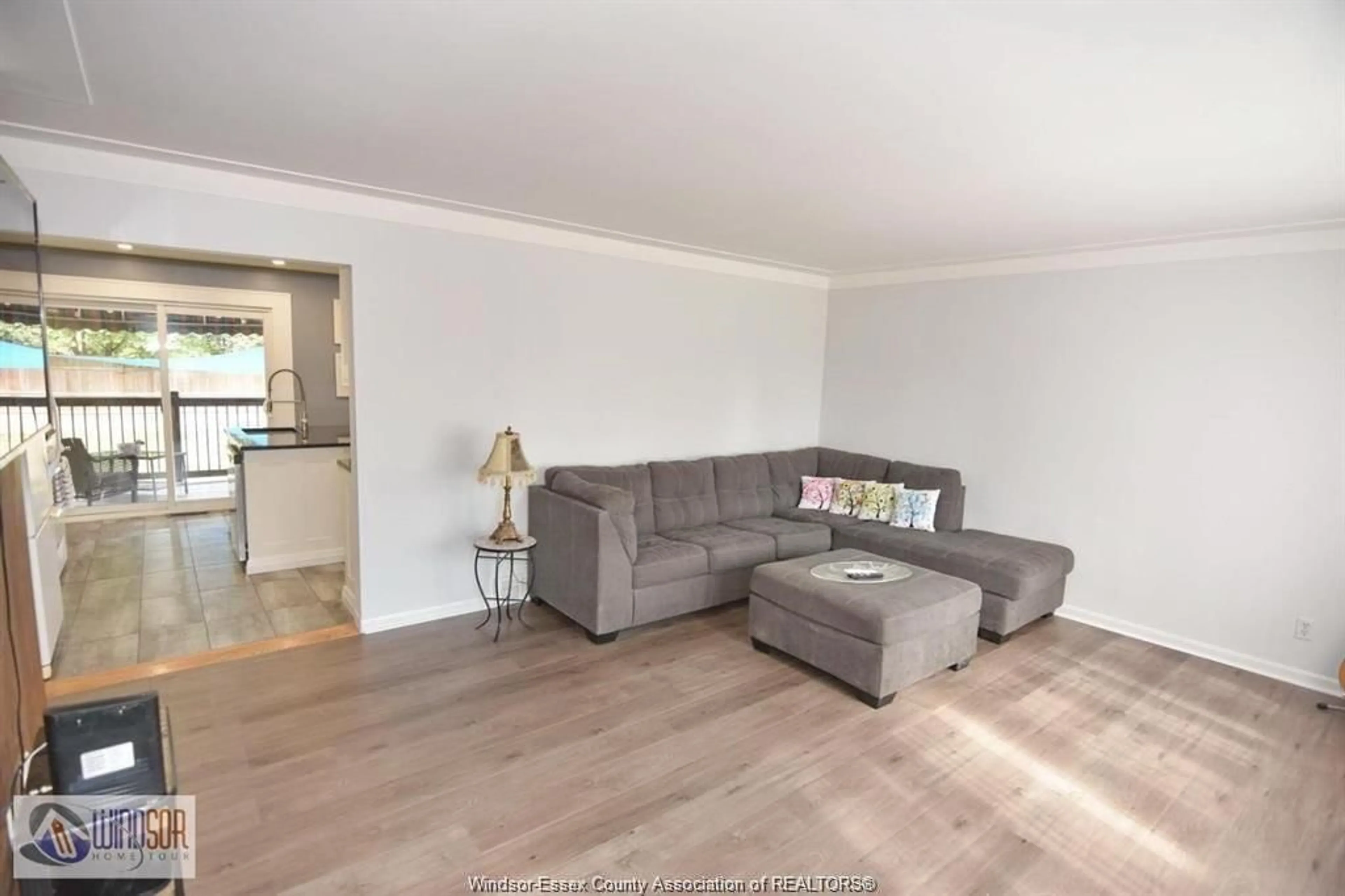 Living room with furniture, wood/laminate floor for 1050 SCOFIELD, Windsor Ontario N9G 1L7