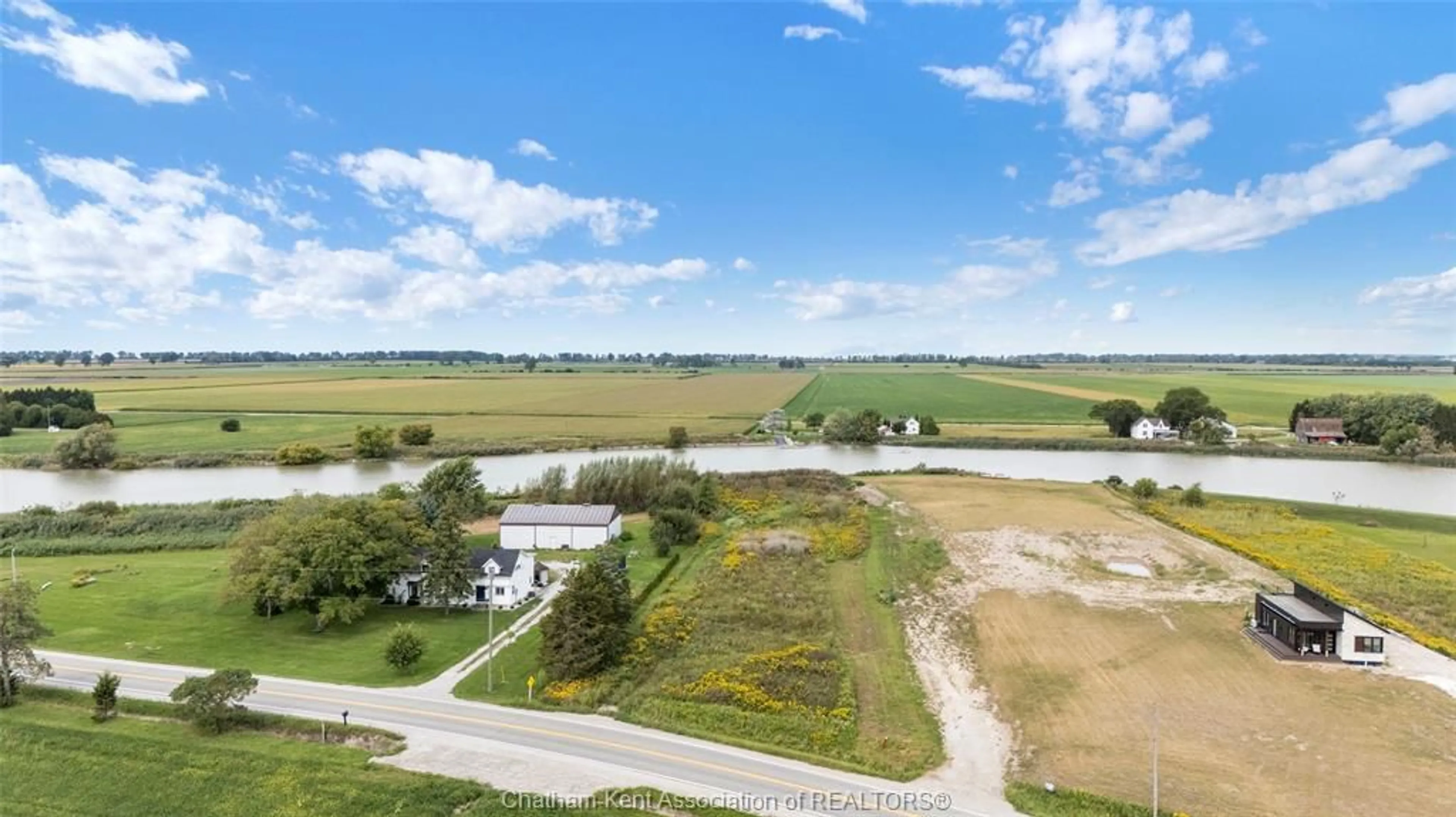A pic from outside/outdoor area/front of a property/back of a property/a pic from drone, water/lake/river/ocean view for 5269 Tecumseh Line, Tilbury Ontario N0P 2L0
