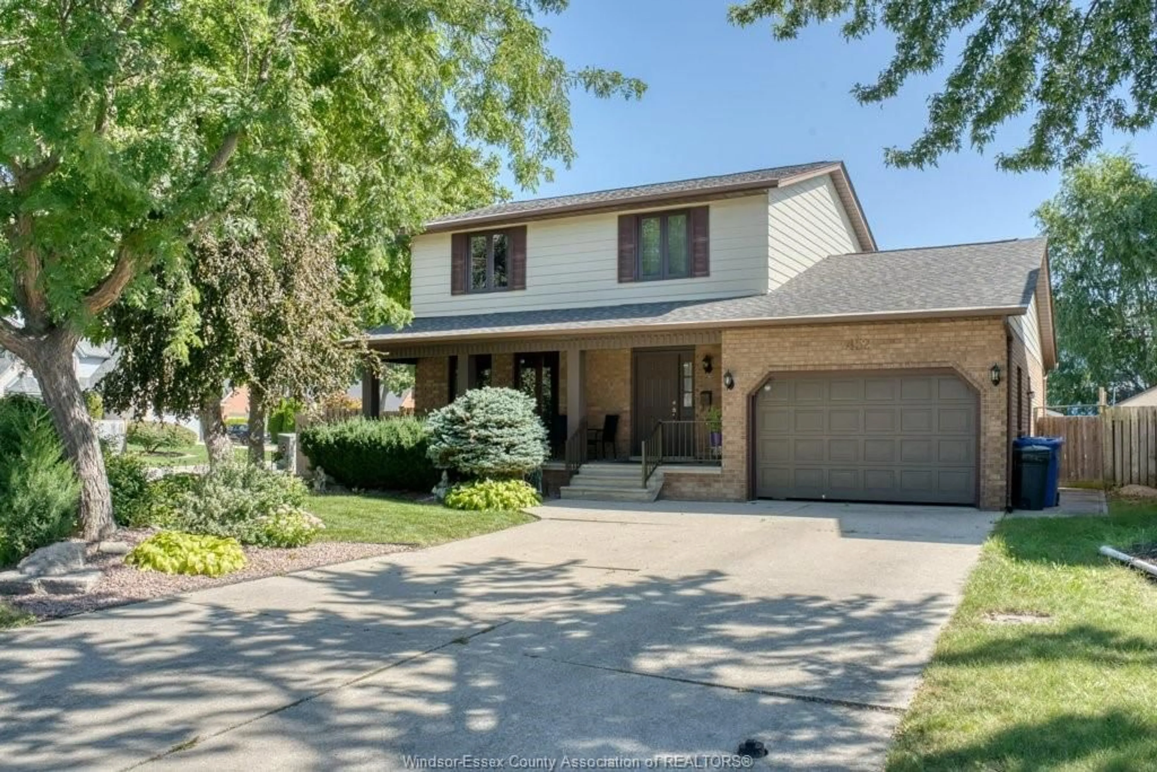 Home with brick exterior material, street for 452 GREEN VALLEY Dr, Tecumseh Ontario N8N 3L7