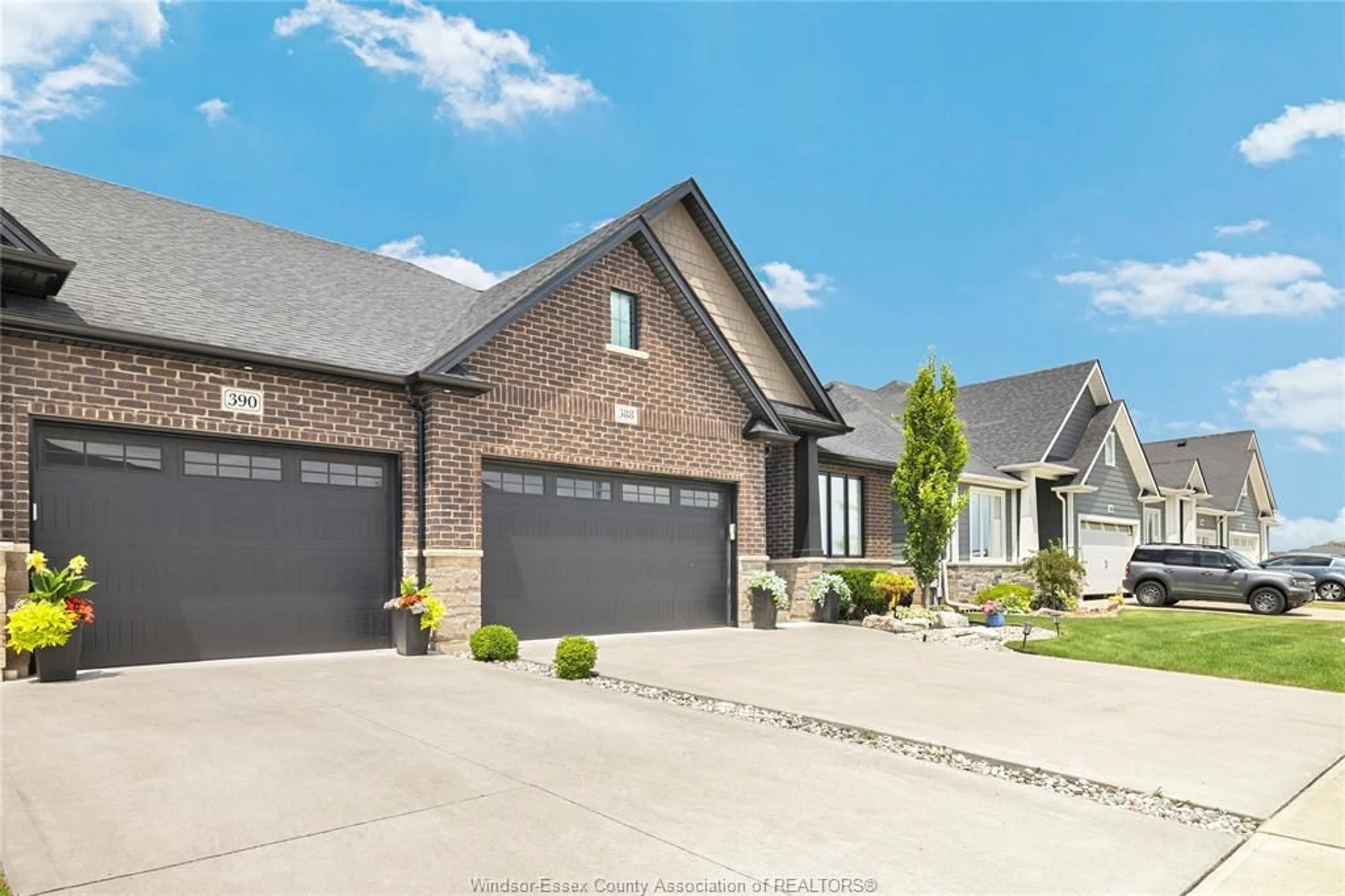 Home with brick exterior material, street for 388 BRUNMAR Cres, Lakeshore Ontario N8L 0Y2