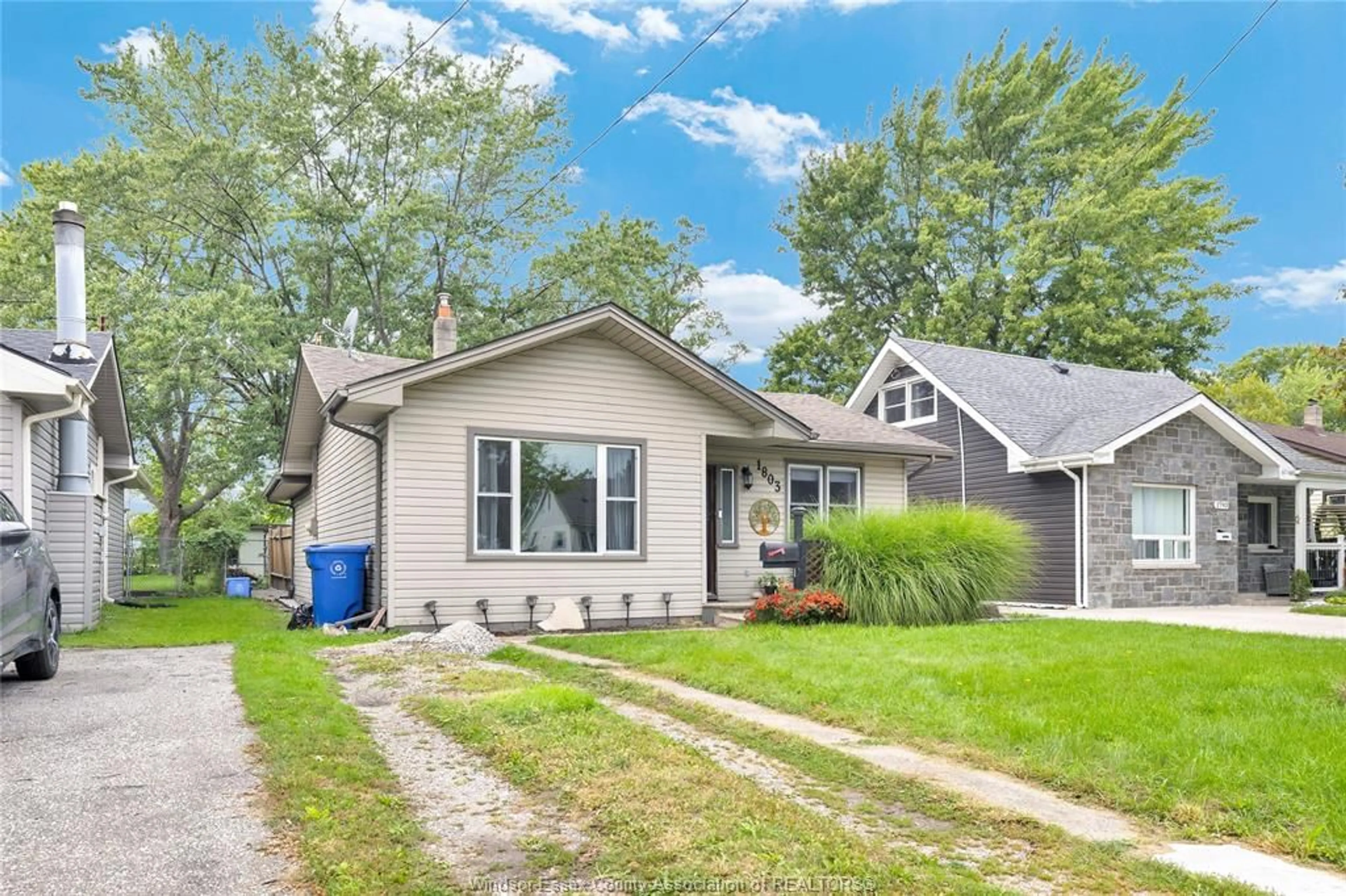 Home with vinyl exterior material, street for 1803 FERNDALE Rd, Windsor Ontario N8T 2K7