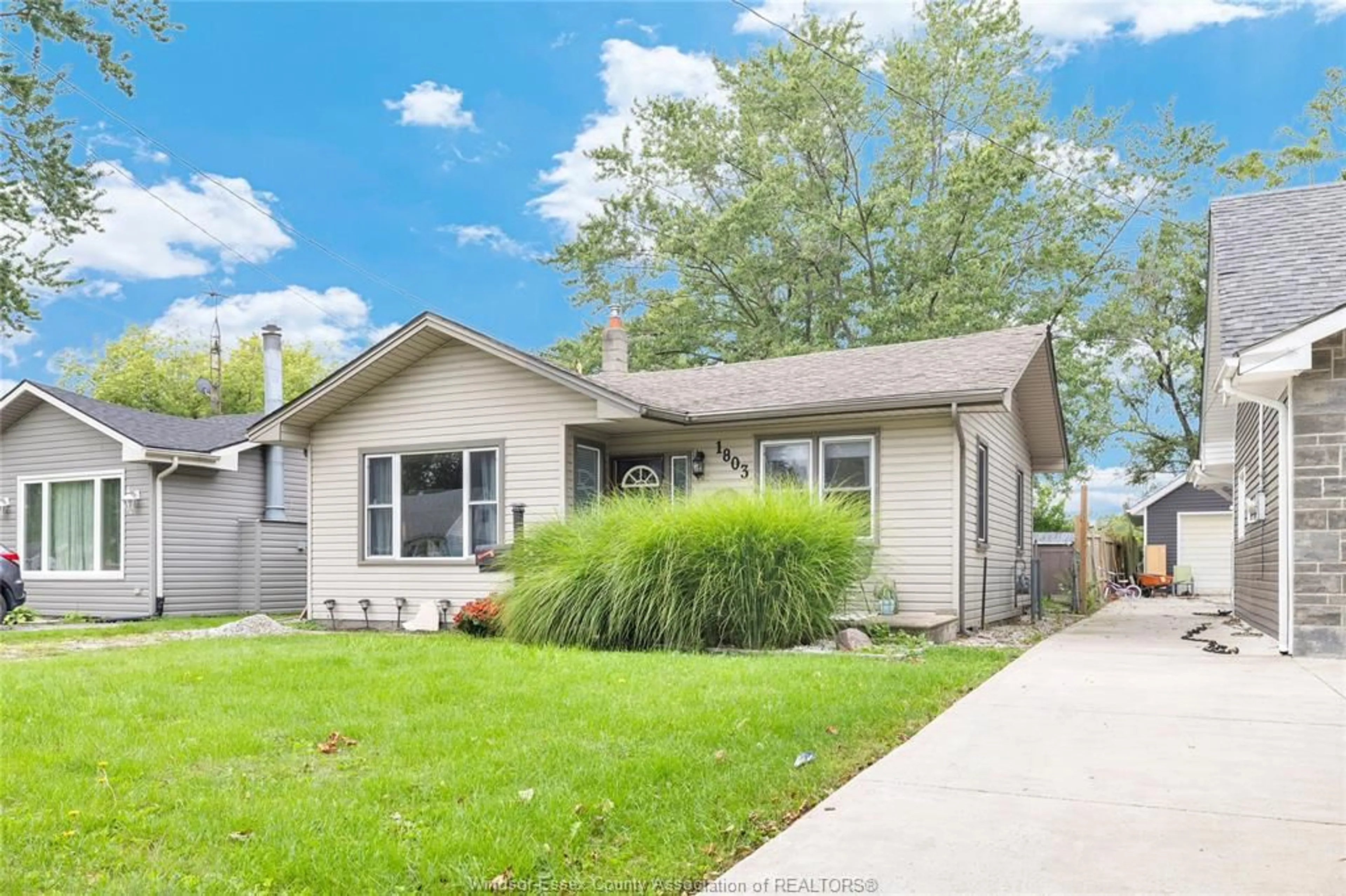 Home with vinyl exterior material, street for 1803 FERNDALE Rd, Windsor Ontario N8T 2K7