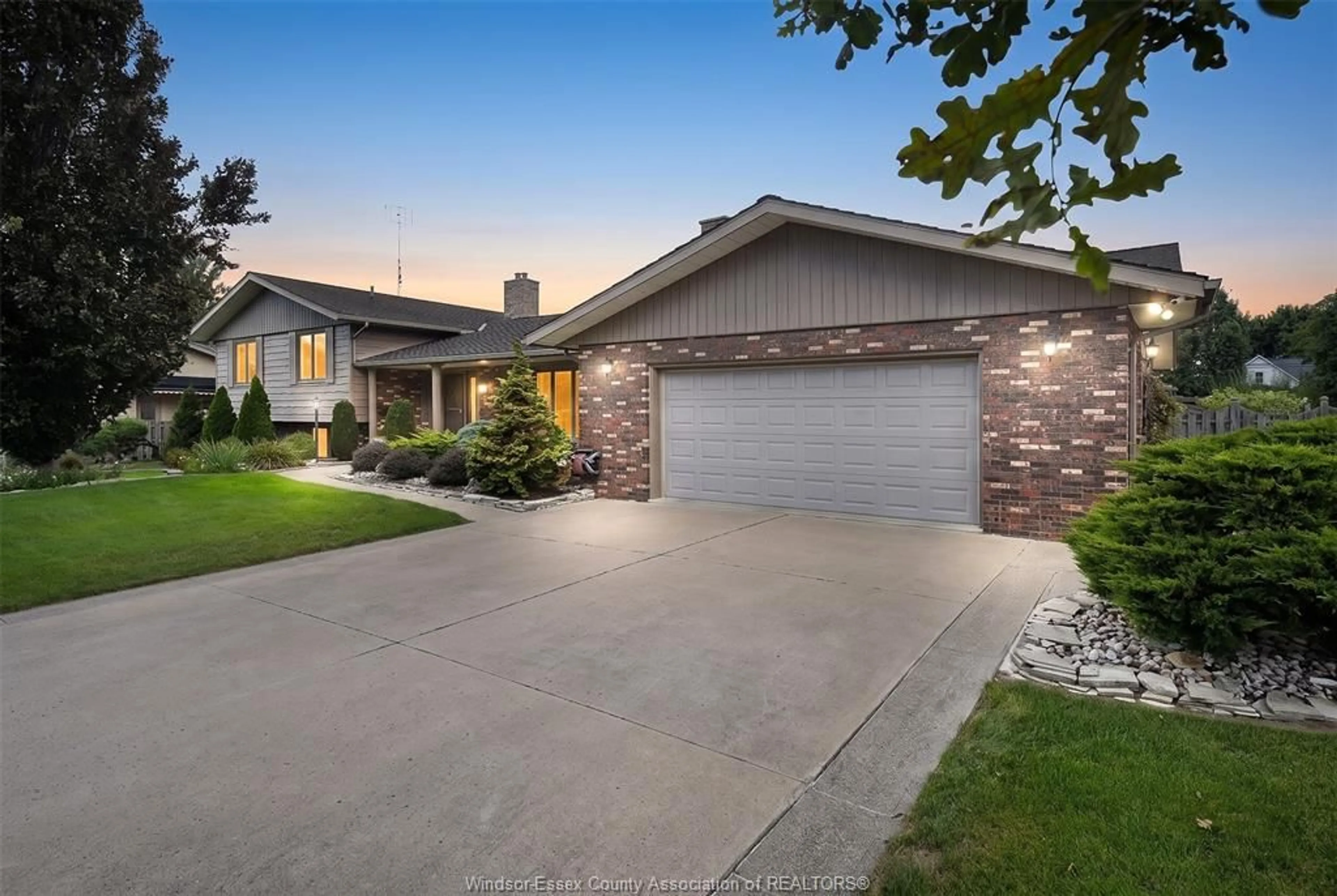 Home with brick exterior material, street for 1528 RAVINE LINE Rd, Kingsville Ontario N9Y 2W9