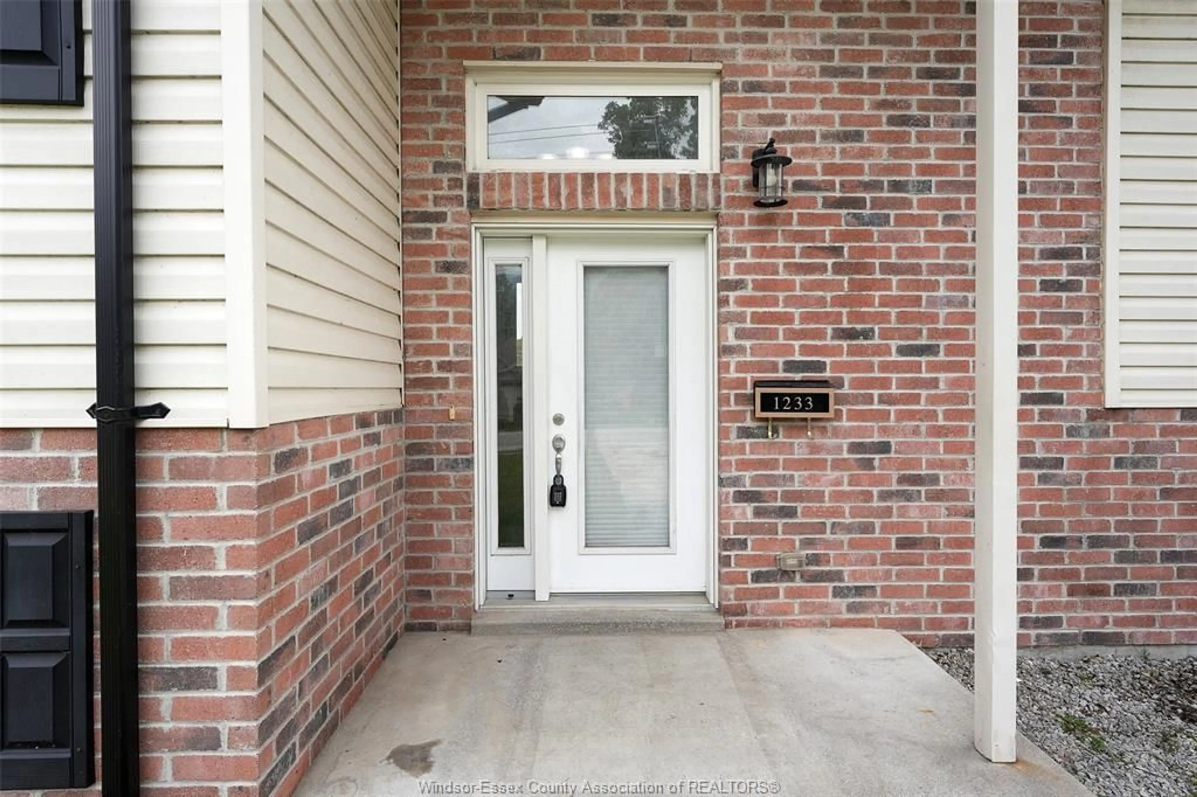 Home with brick exterior material, street for 1233 ARMANDA St, Windsor Ontario N9C 3W8