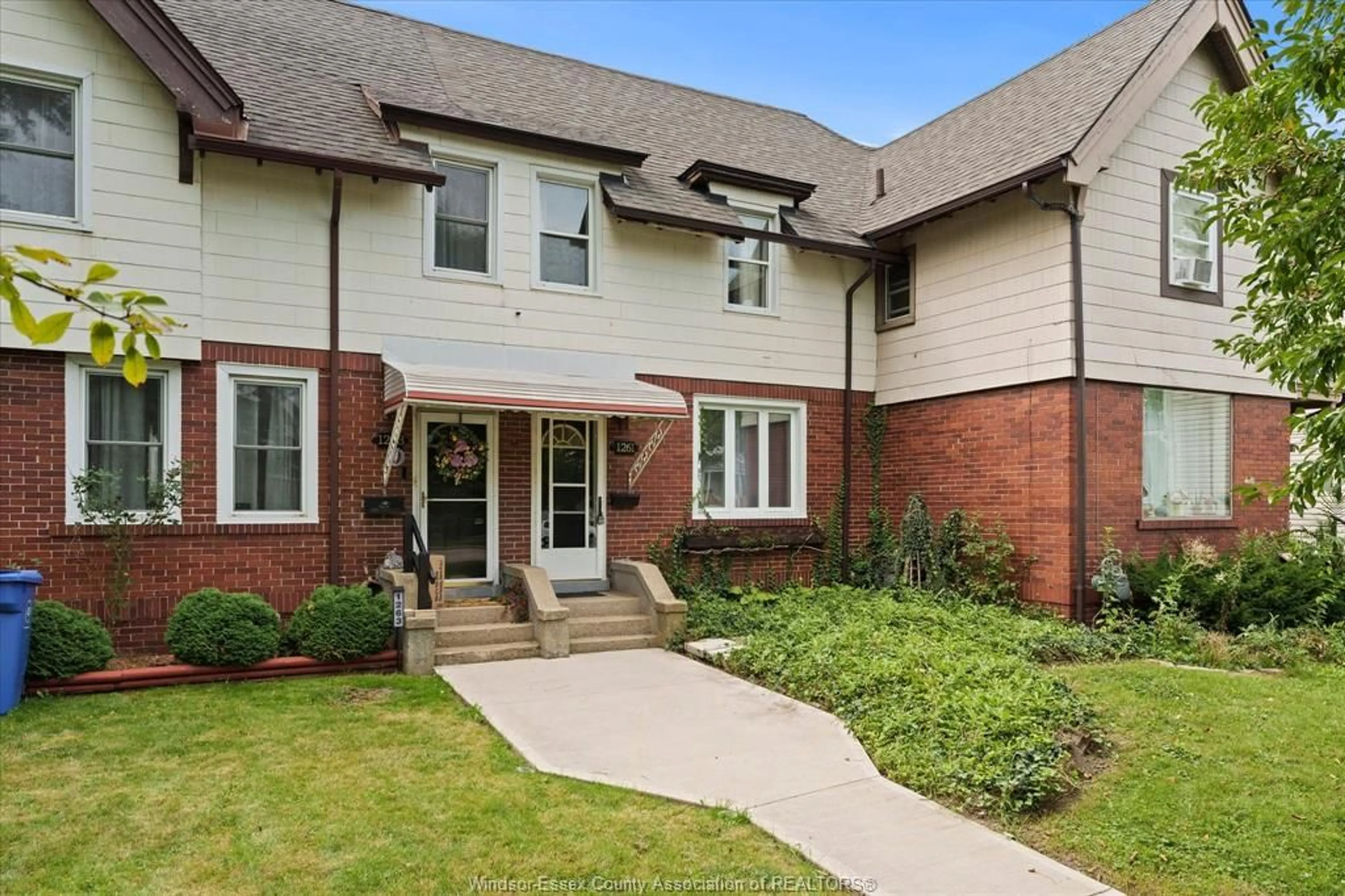 Home with brick exterior material, street for 1261 MONMOUTH Rd, Windsor Ontario N8Y 3M2