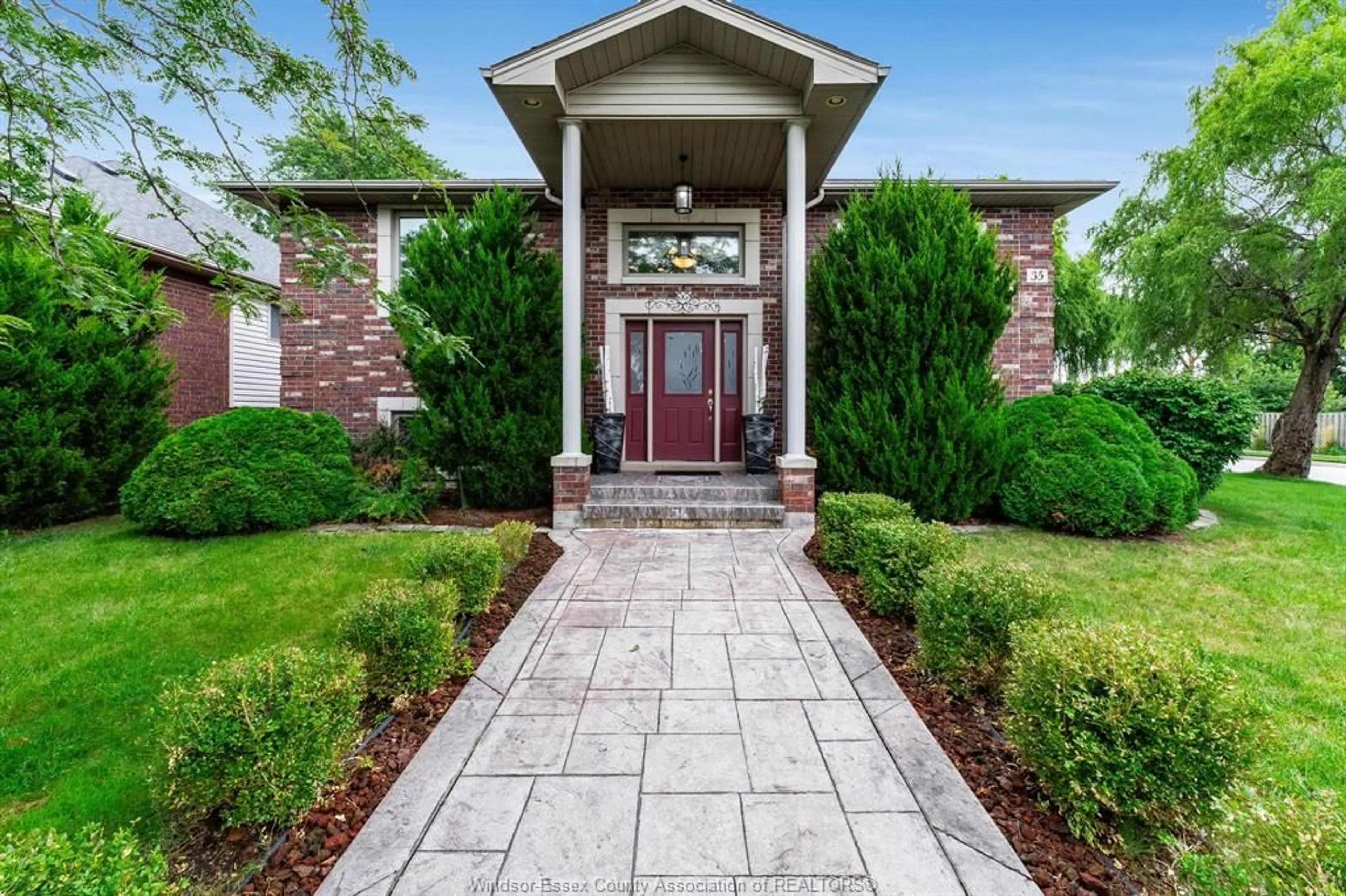 Home with brick exterior material, street for 35 Normandy Ave, Kingsville Ontario N9Y 4E9