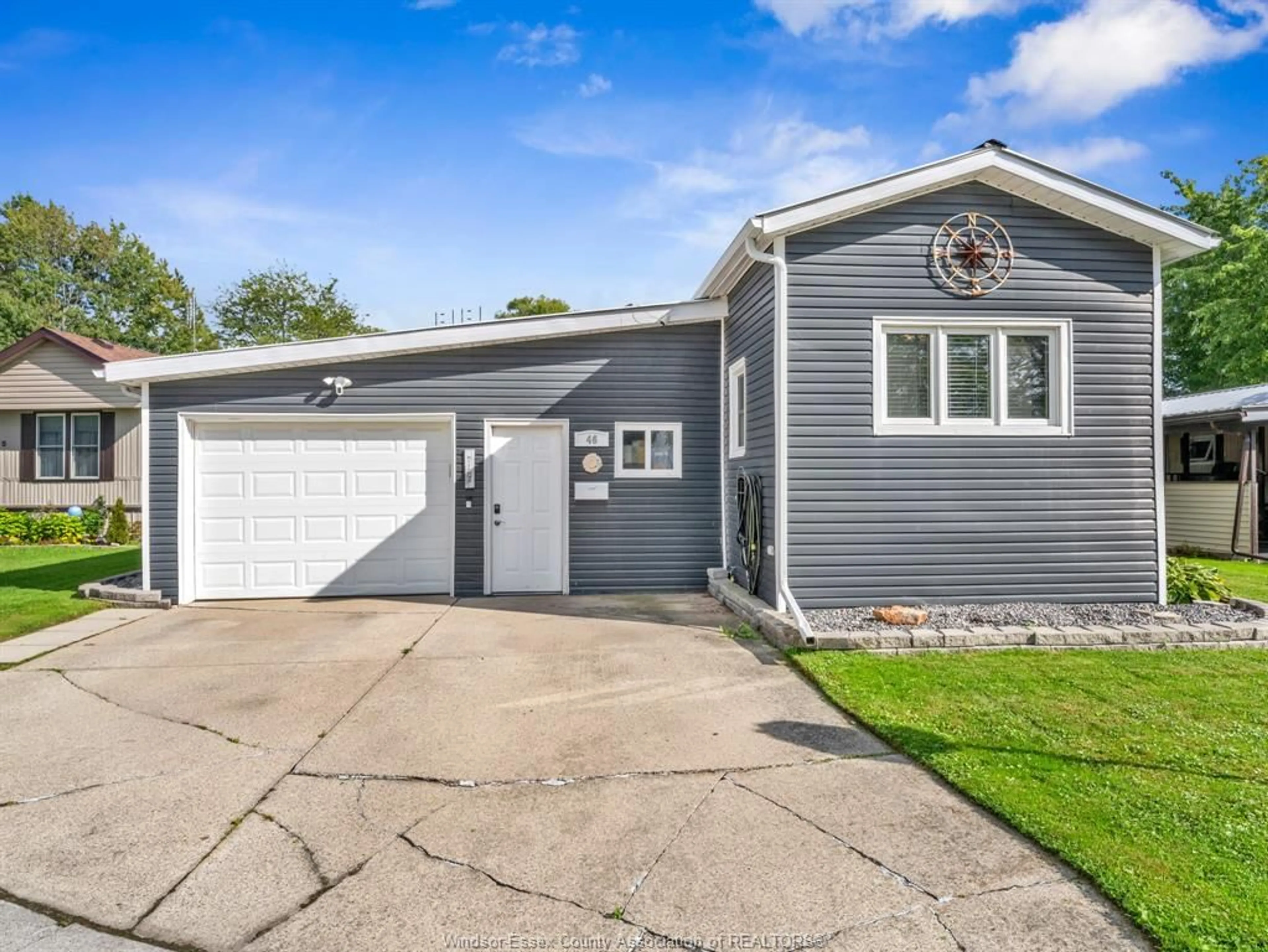 Home with vinyl exterior material, street for 46 DIANE Cres, Essex Ontario N8M 1Z3
