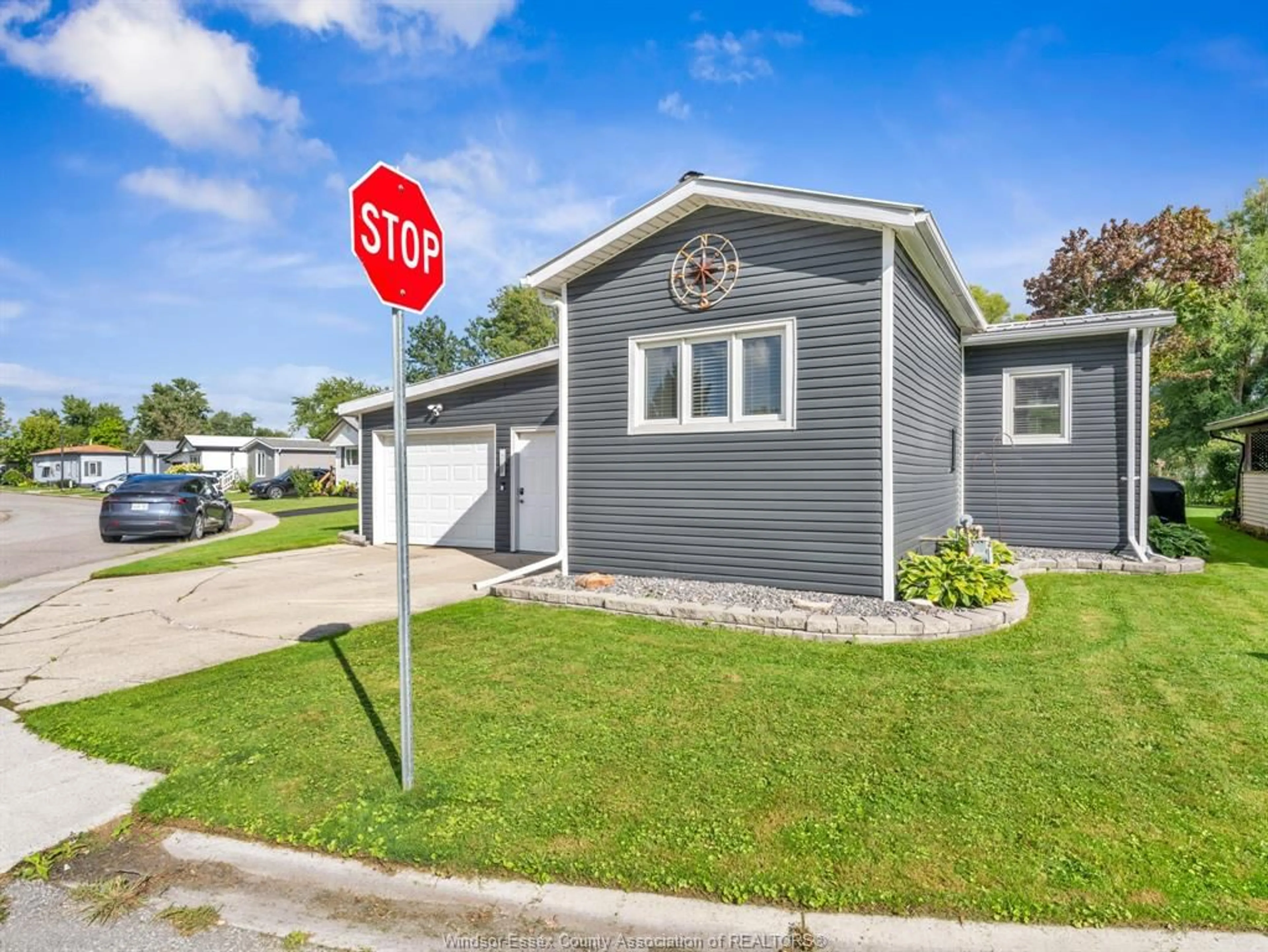 Home with vinyl exterior material, street for 46 DIANE Cres, Essex Ontario N8M 1Z3