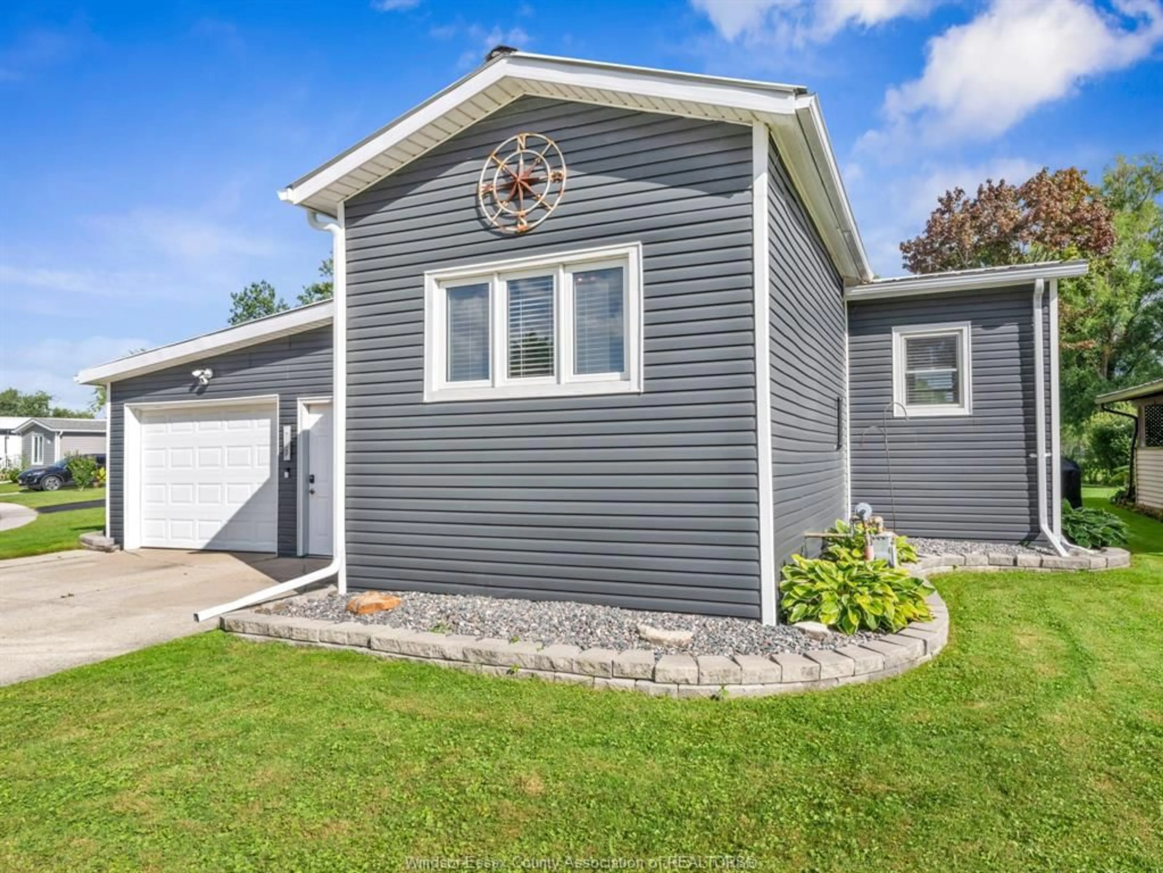 Home with vinyl exterior material, street for 46 DIANE Cres, Essex Ontario N8M 1Z3