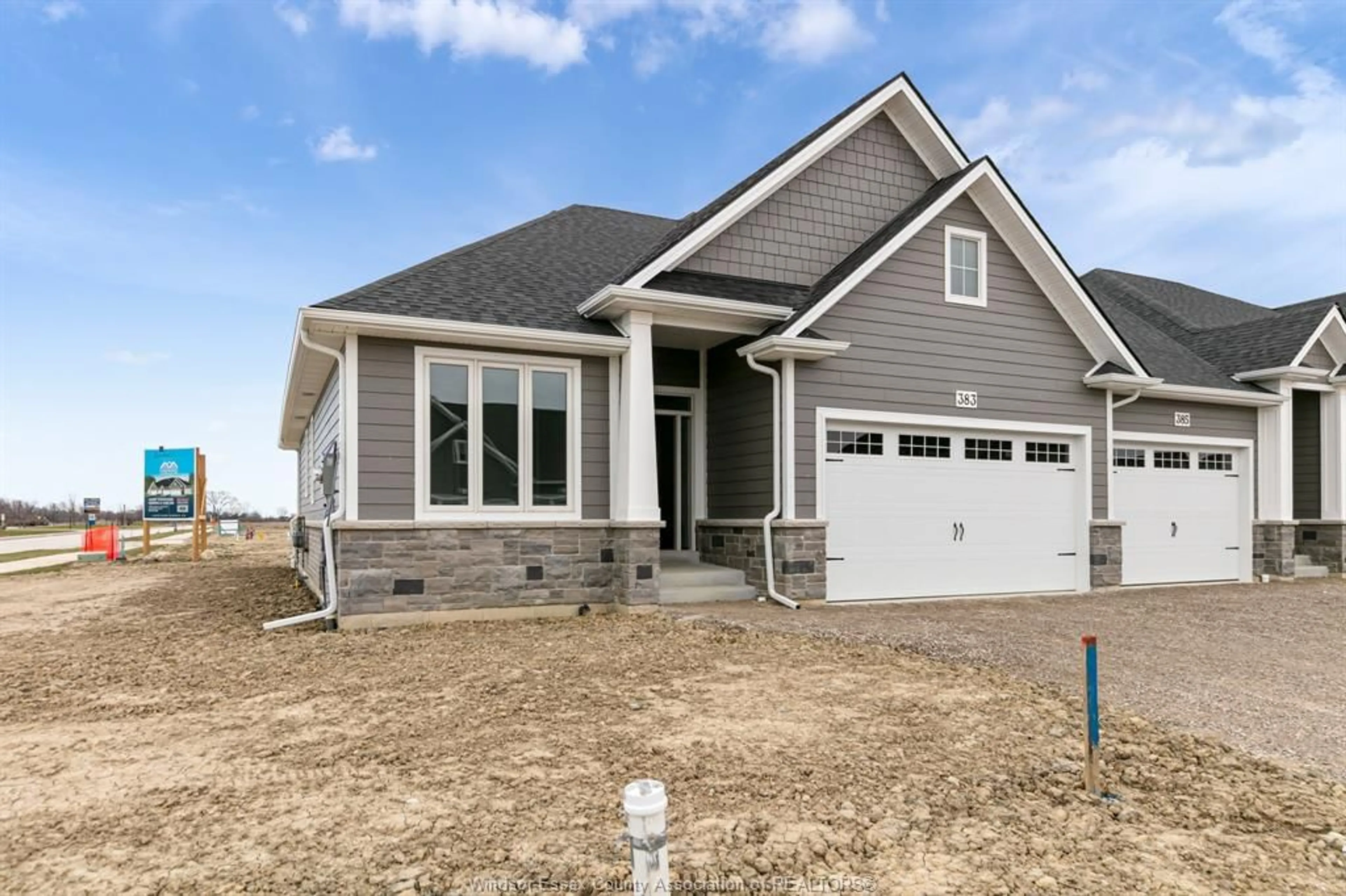 Home with vinyl exterior material, street for 445 CASERTA Cres, Lakeshore Ontario N0R 1A0