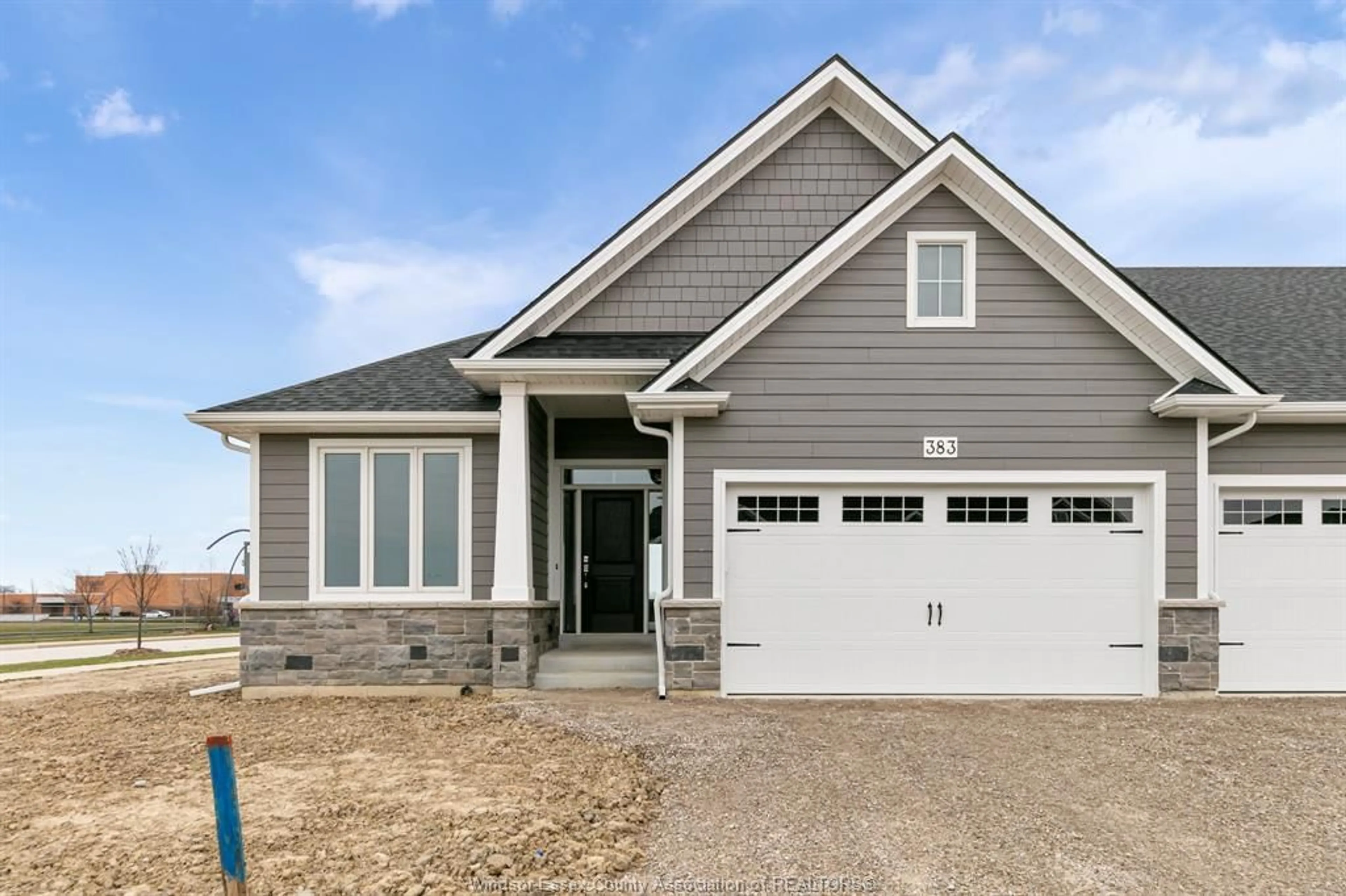 Home with vinyl exterior material, street for 445 CASERTA Cres, Lakeshore Ontario N0R 1A0