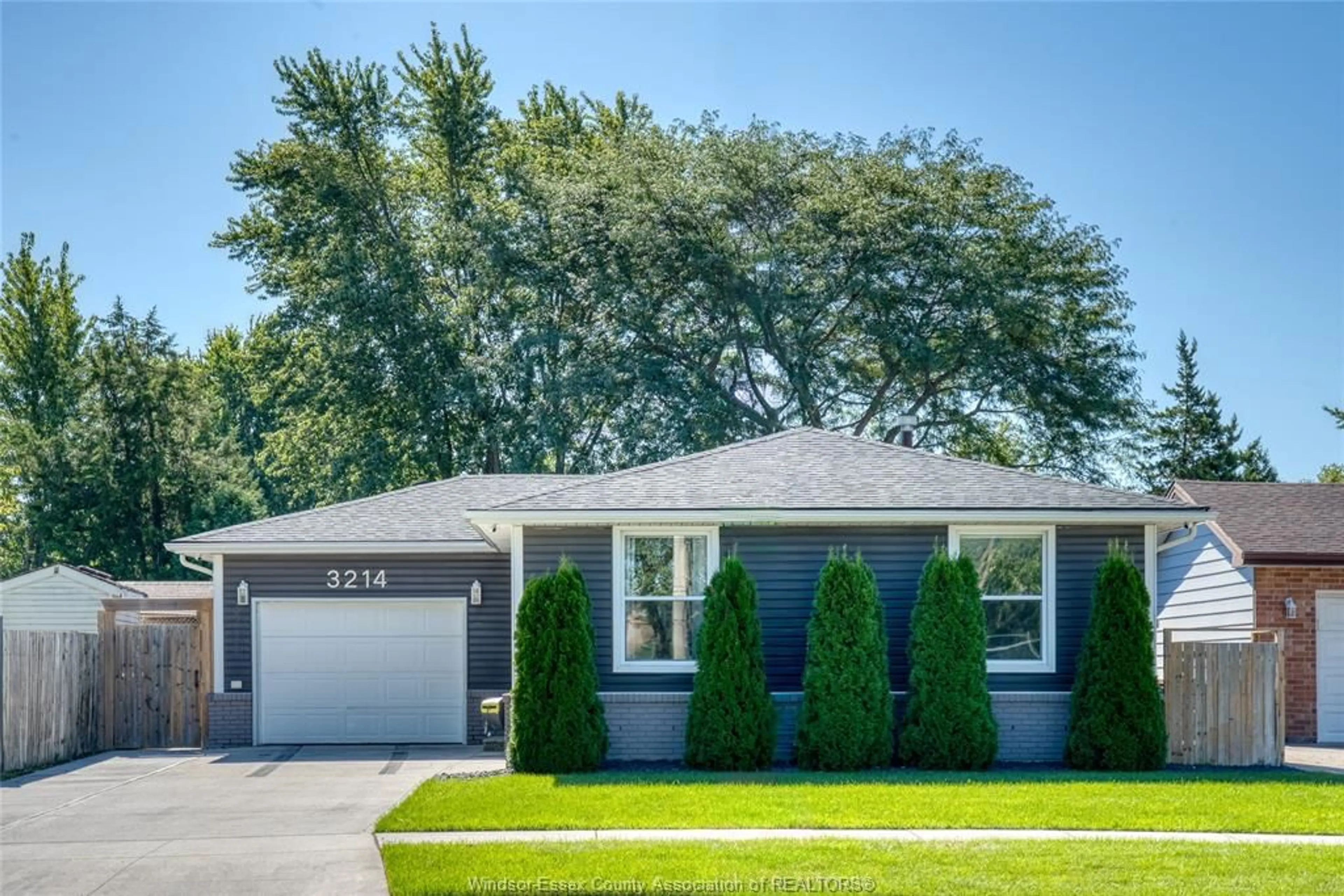 Home with vinyl exterior material, street for 3214 FOREST GLADE Dr, Windsor Ontario N8R 1X3