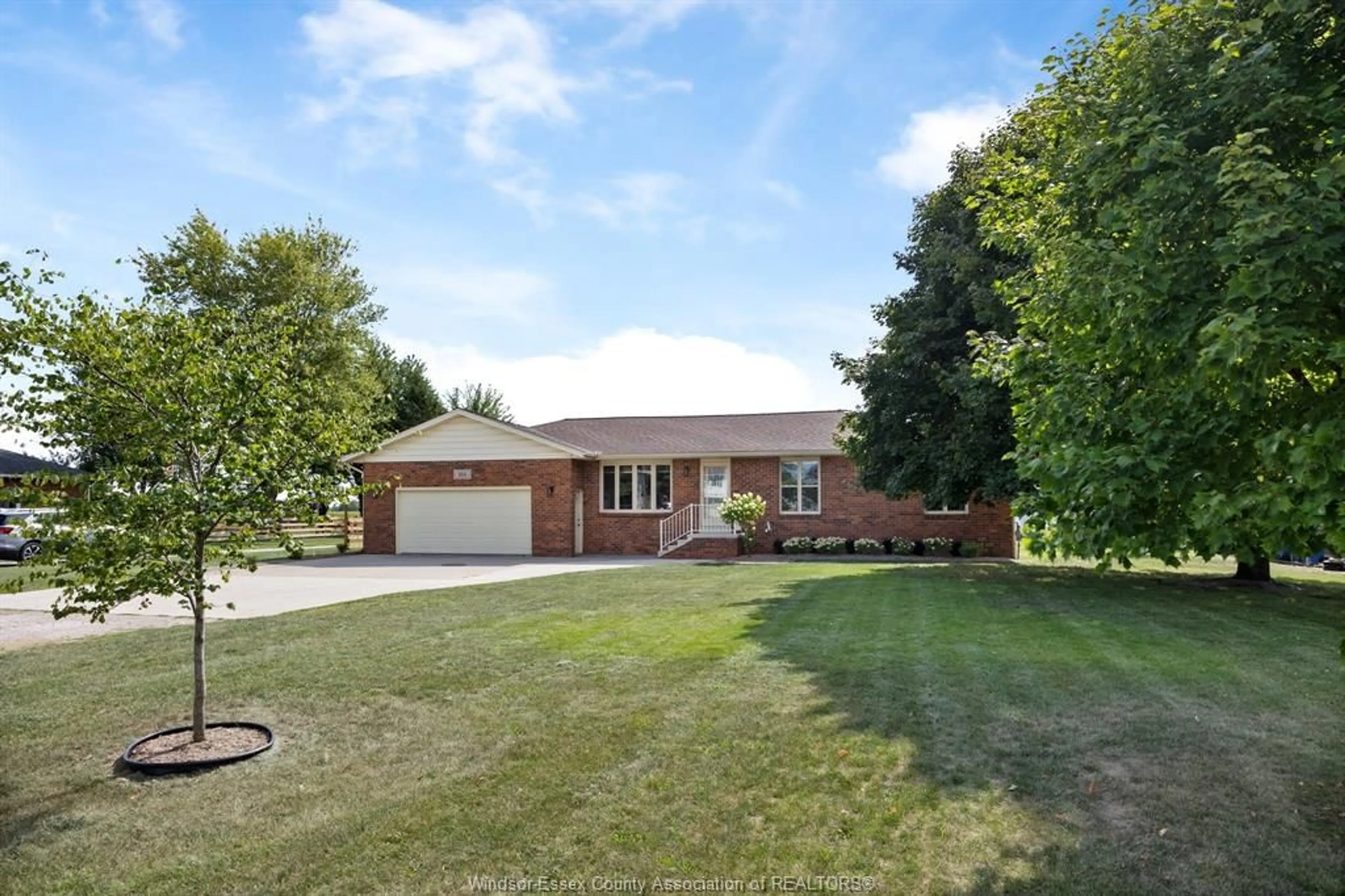 A pic from outside/outdoor area/front of a property/back of a property/a pic from drone, street for 164 COUNTY ROAD 34, Cottam Ontario N0R 1B0