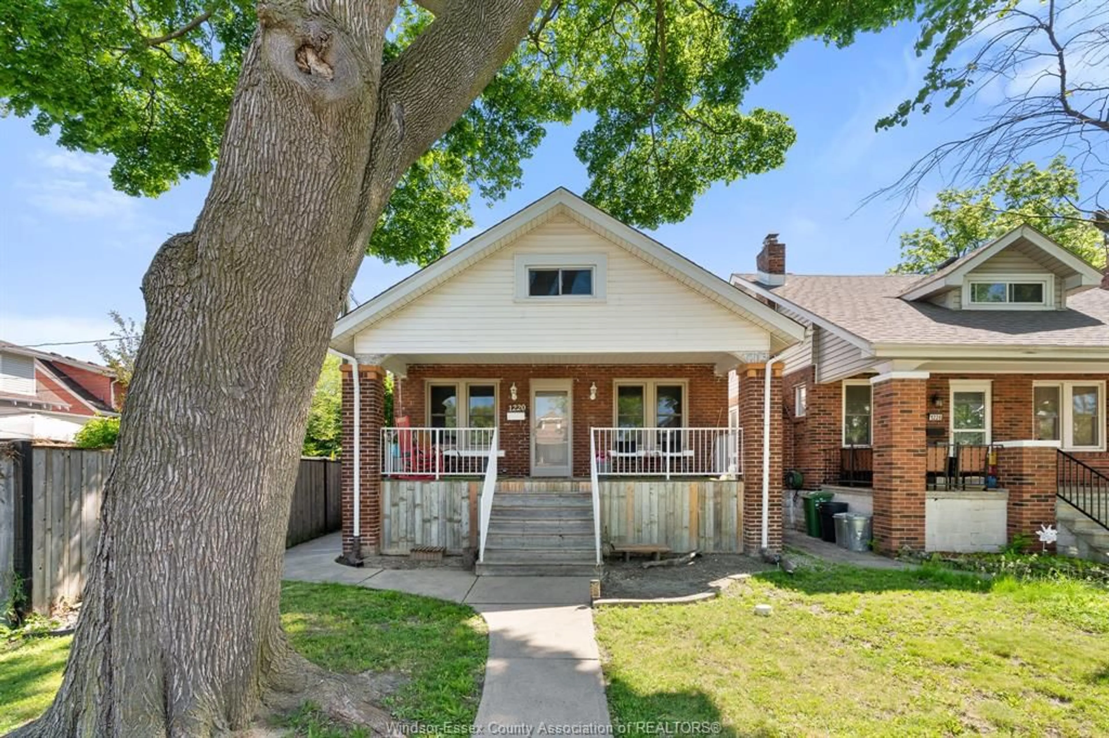 Home with brick exterior material, street for 1220 BRUCE Ave, Windsor Ontario N8X 1X3